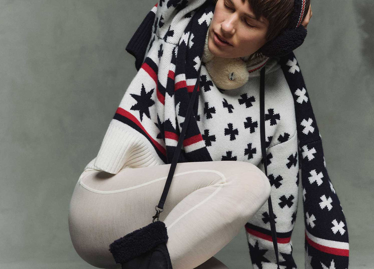 EMU x WN Sweater Women - Model is wearing the Off white sweater with the EMU x WN Blurred teddy boots, EMU x WN Angahook earmuffs and EMU x WN Montana mittens