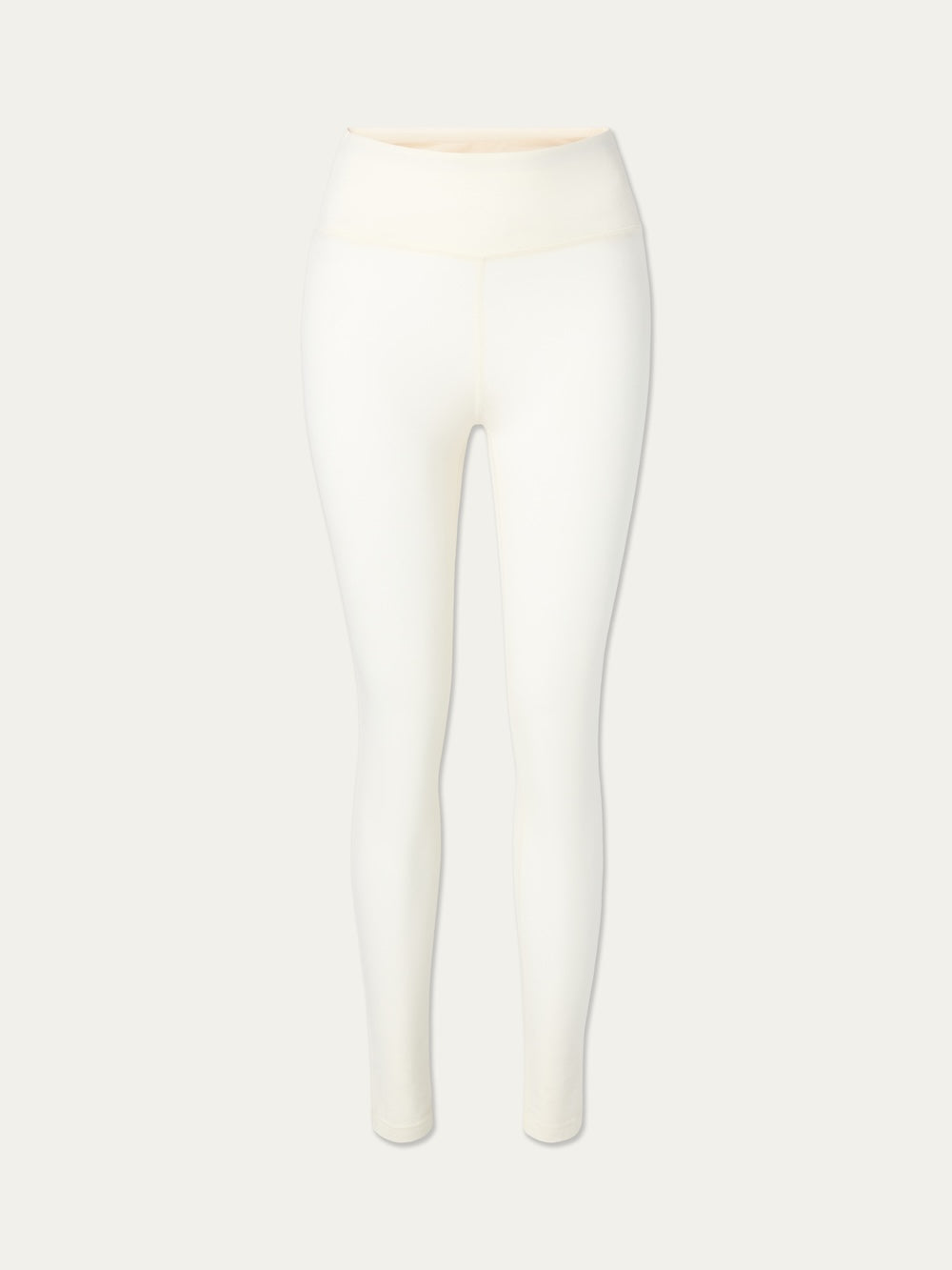 The We Norwegians Sno Merino Leggings Women are high-waisted white leggings, inspired by Scandinavian base layer designs, shown from the front against a simple light background with no visible branding or extra design features.