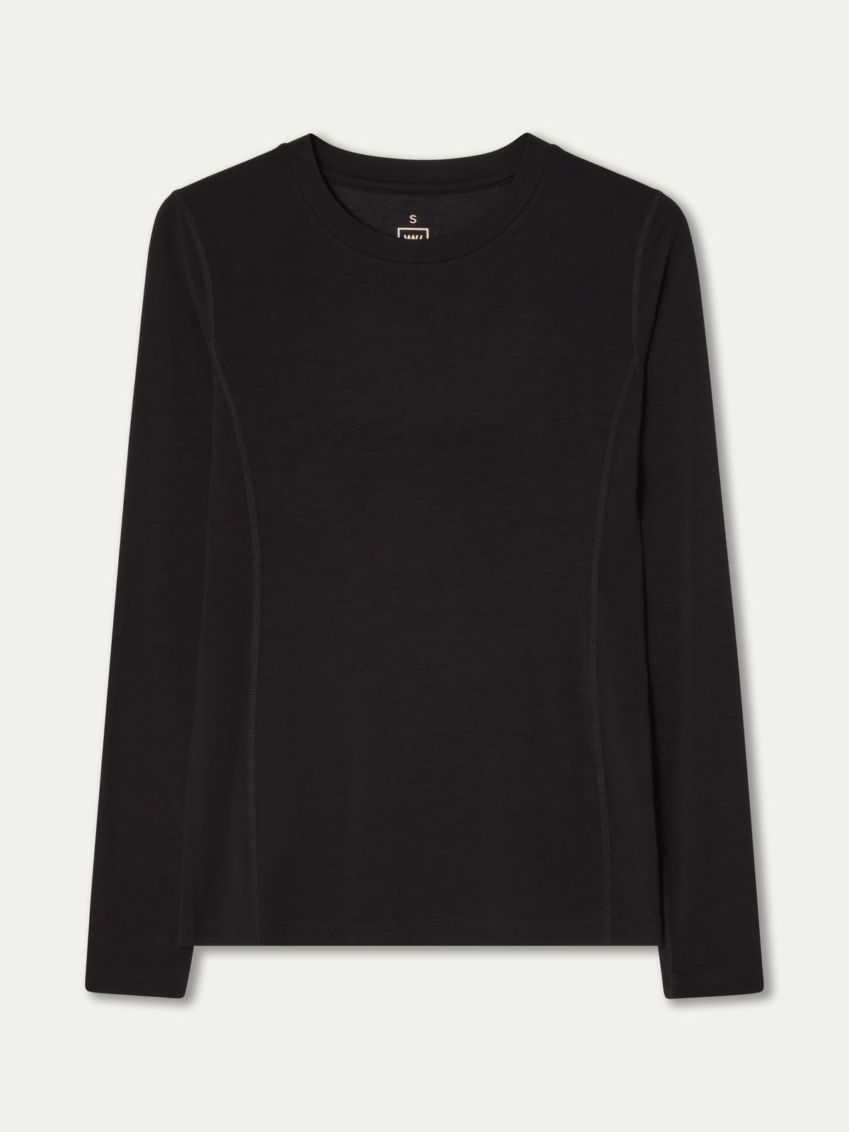 A black long-sleeve crewneck shirt, the Sno Merino Crewneck Women by We Norwegians, is laid flat on a white background. Made from breathable single jersey, this Scandinavian luxury base layer features a minimalist design with no visible logos or patterns.