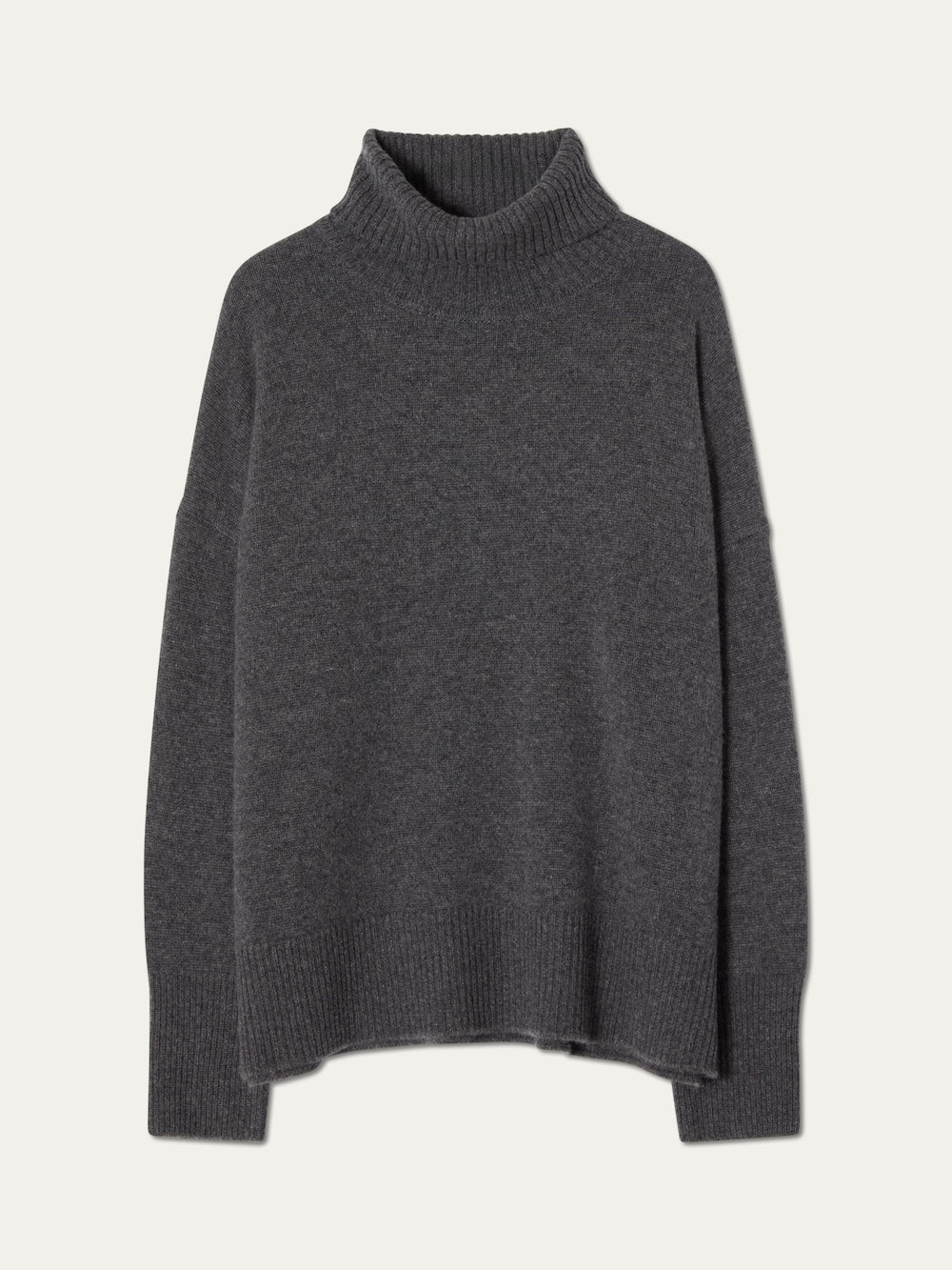 The We Norwegians Blefjell Sweater Women - Pure Cashmere is a dark gray, long-sleeve sweater with a relaxed fit and ribbed cuffs, hem, and collar, displayed flat on a light background.