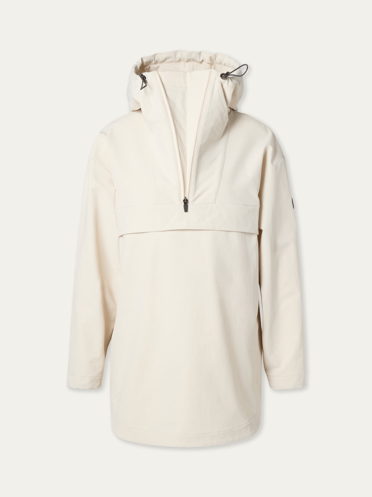 The Beito Anorak Women by We Norwegians is a cream long-sleeve ski pullover with a half-zip, adjustable drawstring hood, loose fit, and minimalist design inspired by classic Norwegian outdoor style.