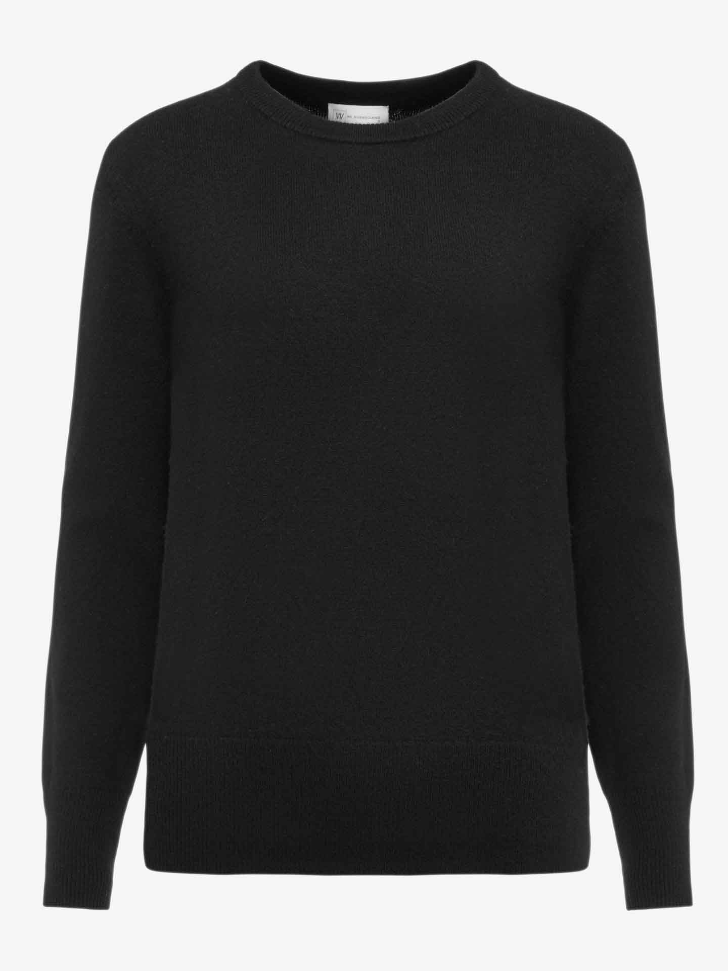 A black, long-sleeved Blefjell Cashmere Crewneck Women sweater by We Norwegians is displayed against a plain white background. This luxury staple features a simple, classic design with ribbed cuffs, hem, and neckline, all crafted from pure cashmere.