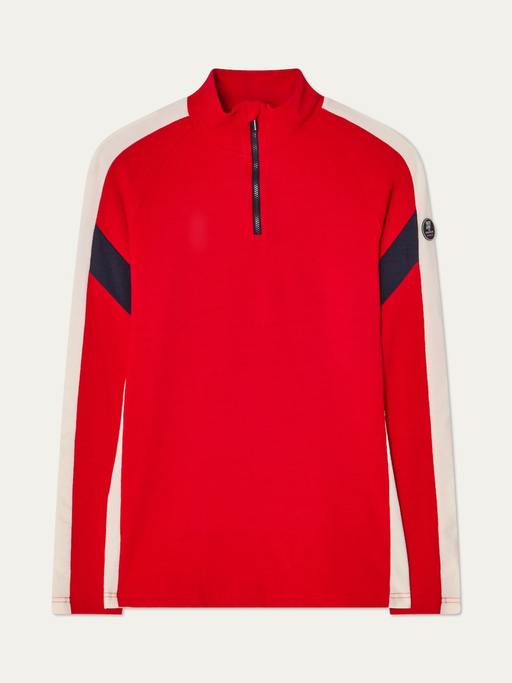 The We Norwegians Zermatt Zipup Men is a red long-sleeve ski sweater with a half-zip front, white sleeve panels, black diagonal arm stripes, and a circular logo patch on the upper left sleeve.