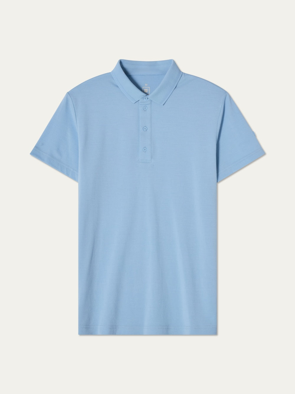 The We Norwegians Medalist Piqué Polo Men in light blue features a moisture-wicking fabric, classic collar, and three-button placket, shown laid flat on a white background.