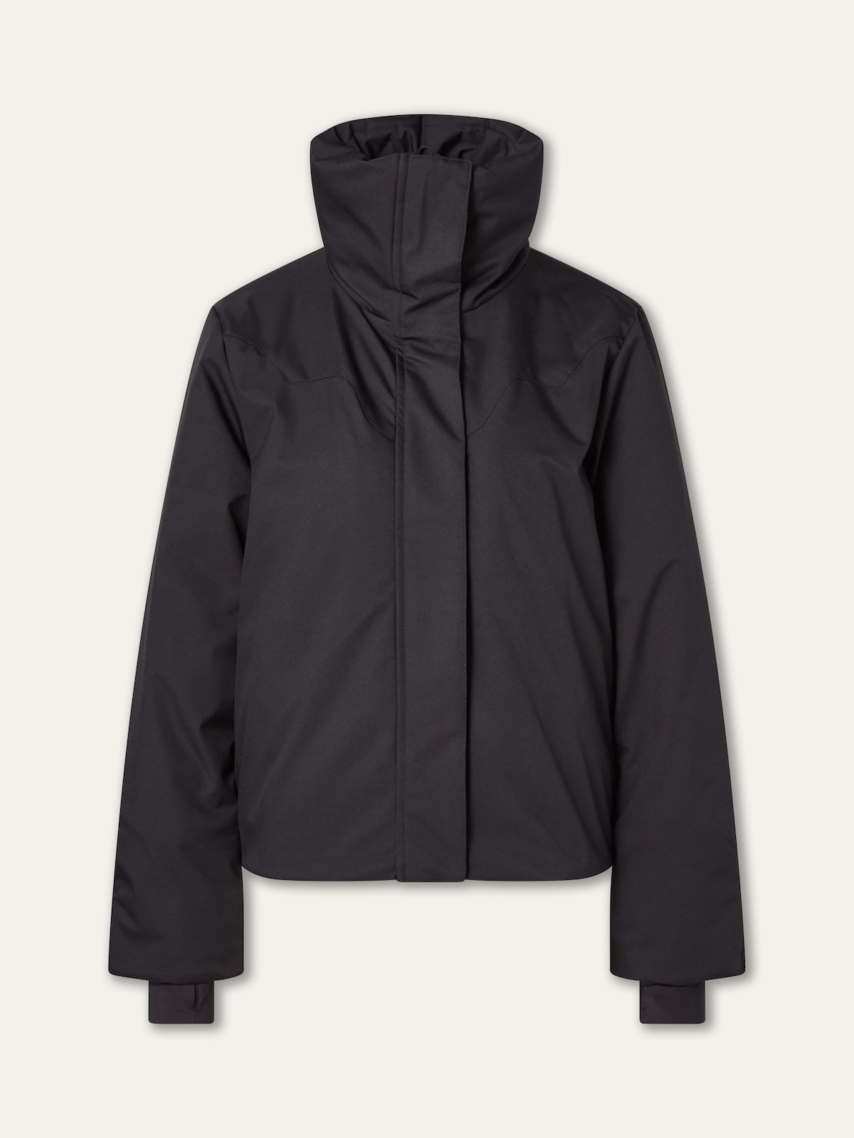 The We Norwegians Western Ski Jacket for women is a black, long-sleeve, high-collar puffer with natural wool padding and a front zipper. It features a clean, minimal design inspired by classic Western ski styles, shown against a plain light background.