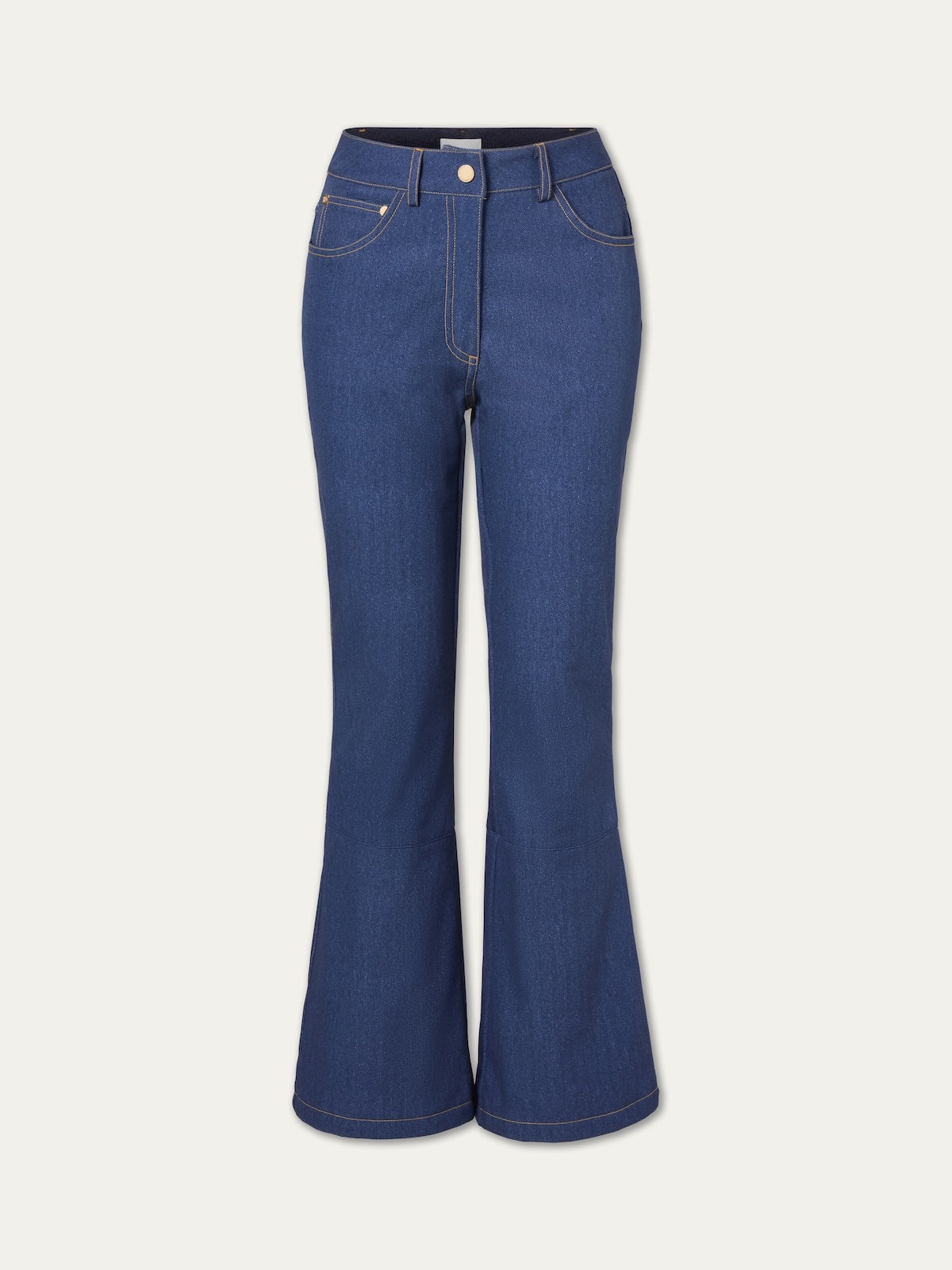 The We Norwegians Western Ski Pant women features blue denim flare legs, yellow stitching, pockets, belt loops, and button-zip closure—ideal for a rodeo-inspired ski look and displayed on a white background.