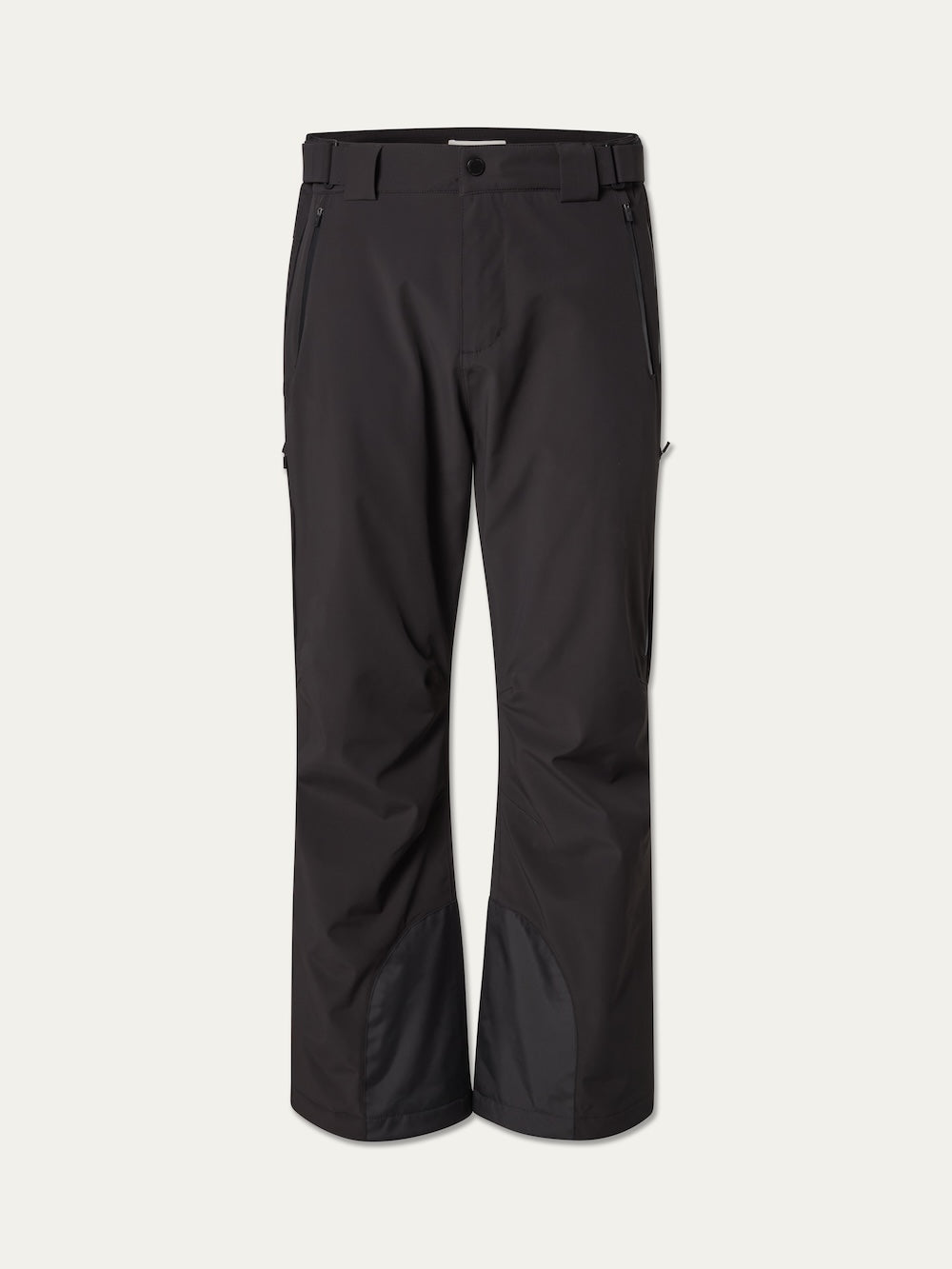 The We Norwegians Hammerfest Ski Pant men features a black waterproof design with belt loops, side zipper pockets, and reinforced fabric at the inner cuffs, shown against a plain light background. These pants are ideal for optimal performance and protection on the slopes.