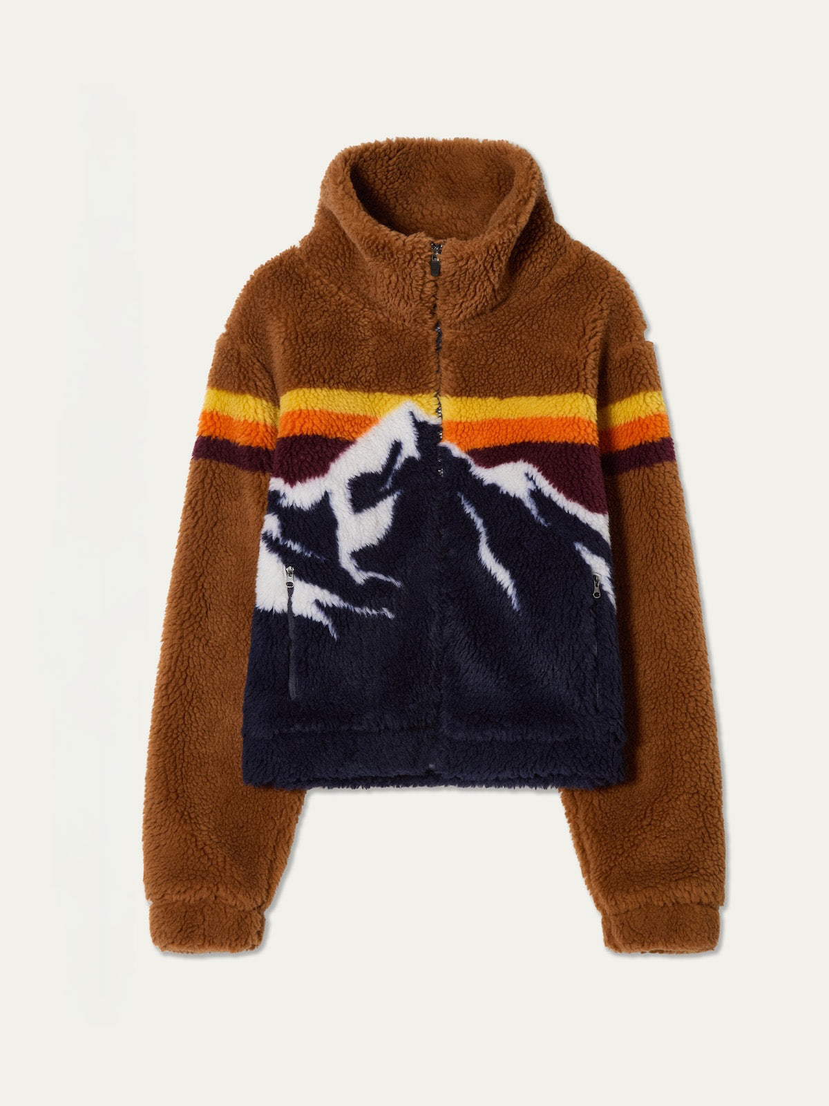 The We Norwegians Snowmass Jacket for women is a brown jacquard fleece pullover with a zip-up collar and colorful mountain landscape stripes—perfect for cozy après-ski style.
