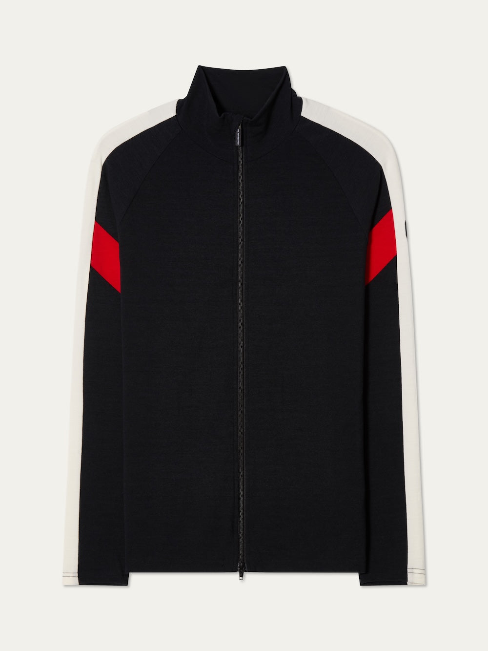 The We Norwegians Zermatt FullZip men’s jacket is black with a high collar, white panels on shoulders and sleeves, plus a bold red stripe on the upper arms—ideal as a sleek ski mid-layer.