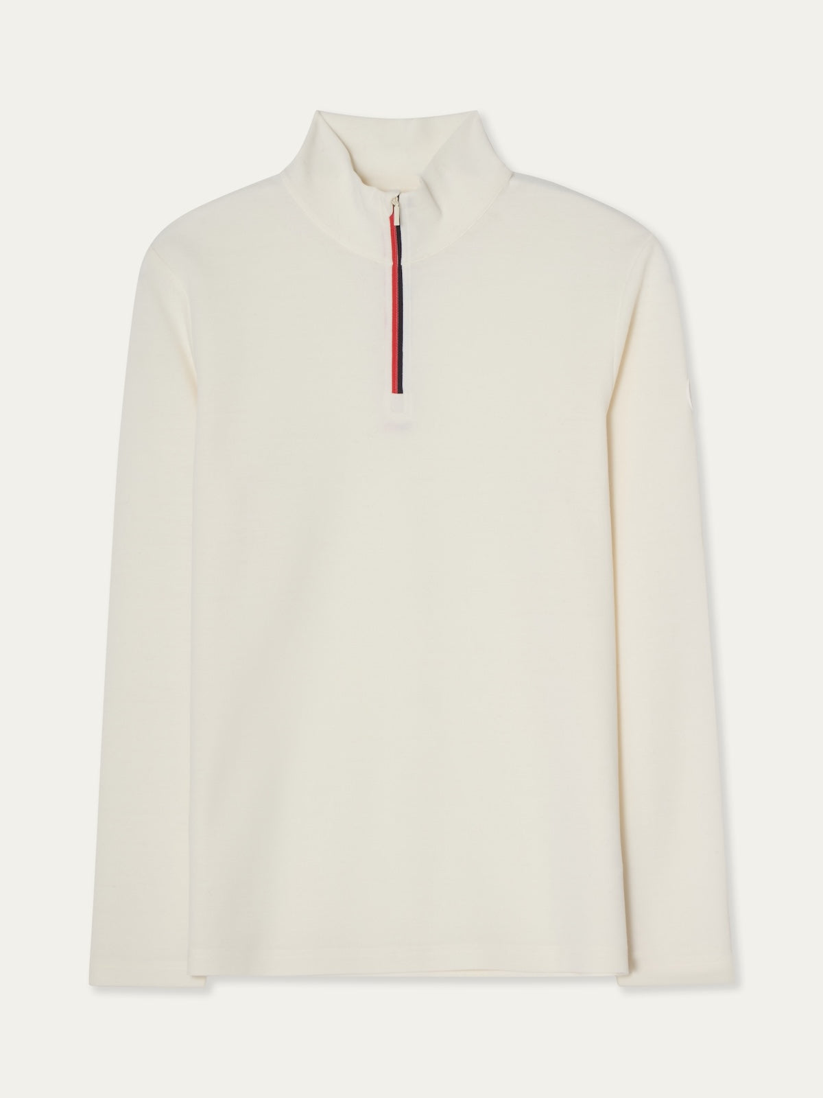 The Bibi ZipUp Solid women by We Norwegians is a soft Merino wool, long-sleeve off-white pullover with a high collar and red-accented half-zip—ideal for ski trips or as a cozy, minimalist base layer.