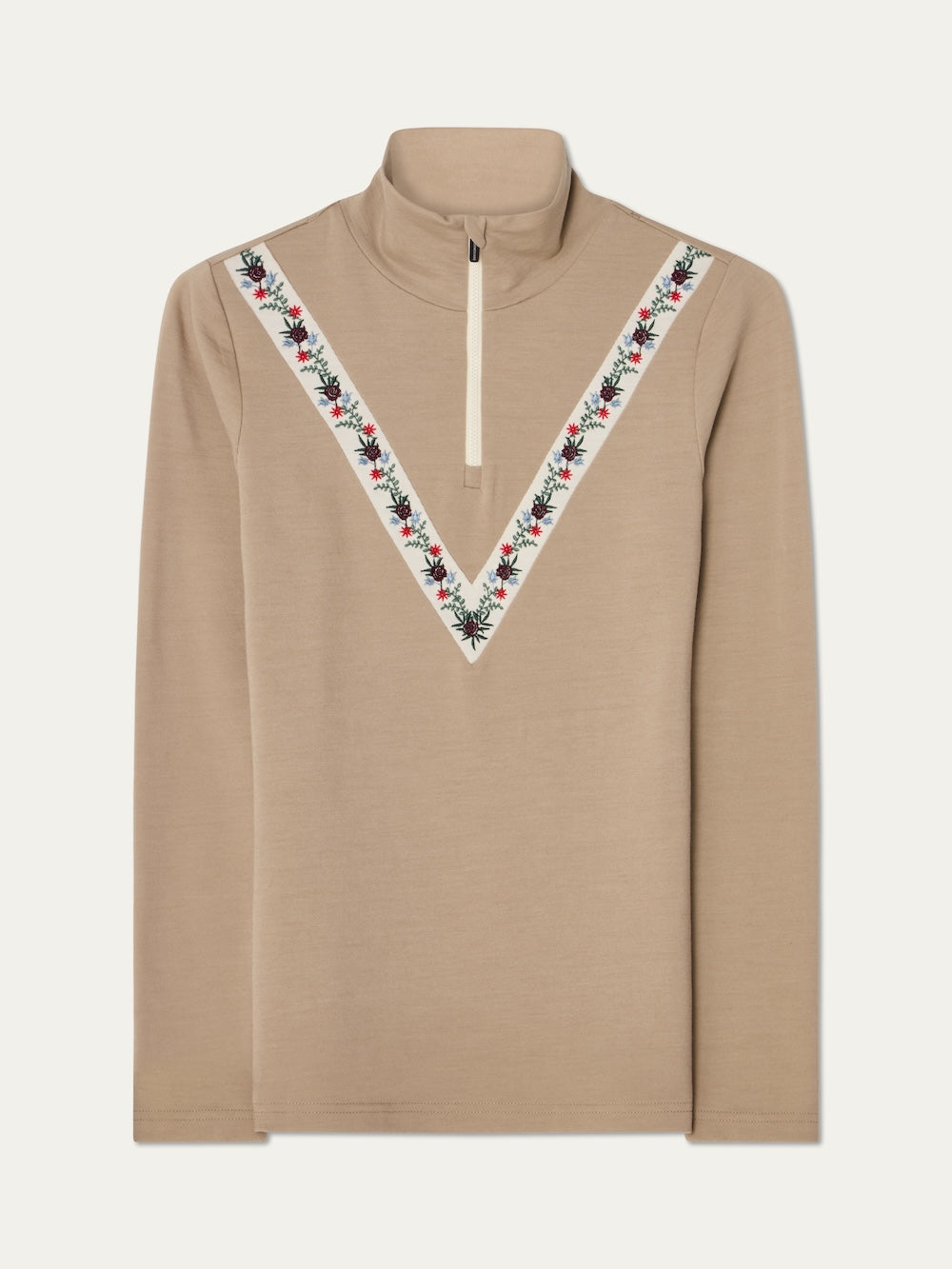 The We Norwegians WN x Markarian ZipUp women is a beige merino wool base layer with long sleeves, high collar, half-zip front, and V-shaped red, white, and black floral embroidery on the chest and shoulders.