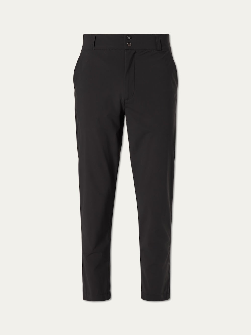 The We Norwegians Albatross Pant Men is a pair of black, slim-fit golf pants with 4-way stretch, breathable performance fabric, button/zipper closure, front pockets, and slightly cropped legs, shown against a plain white background.