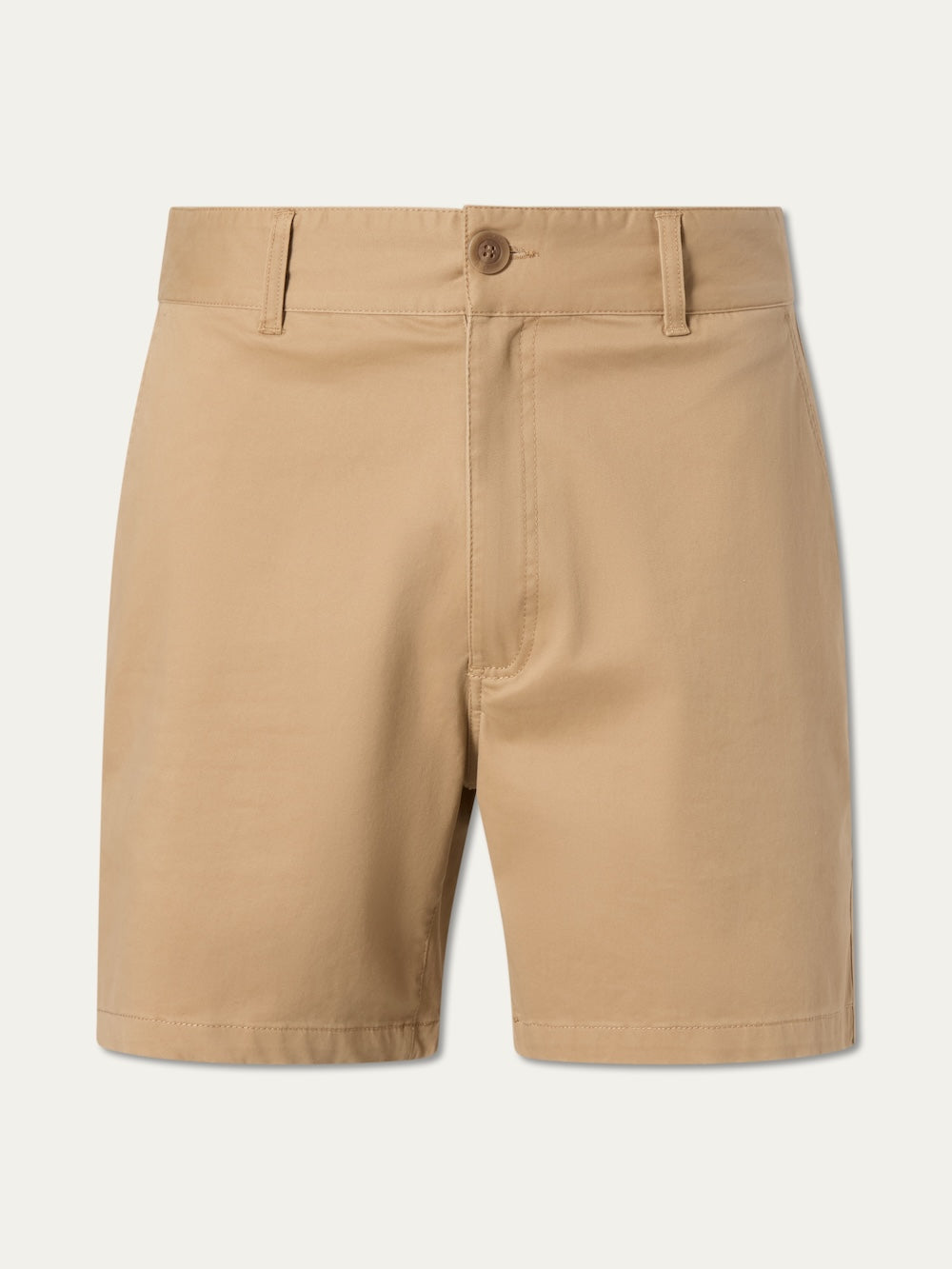 The We Norwegians Sol Shorts Men are tan summer shorts with a tailored relaxed fit, belt loops, button closure, and side pockets, shown against a plain light background.