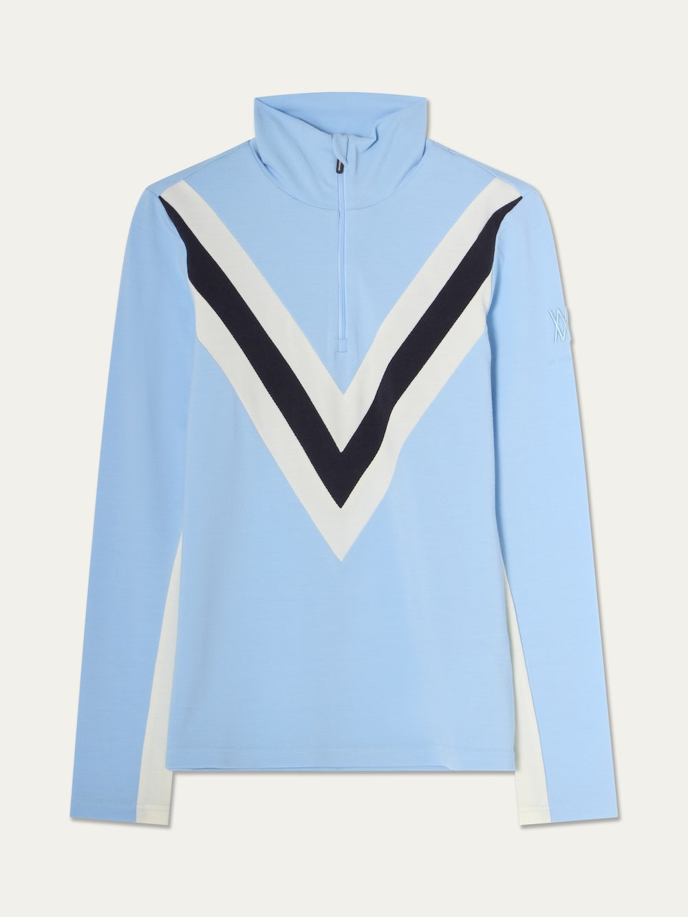 Light blue We Norwegians Voss Chevron ZipUp Women merino wool quarter-zip top with a white and black chevron stripe across the chest and white paneling on the sleeves.