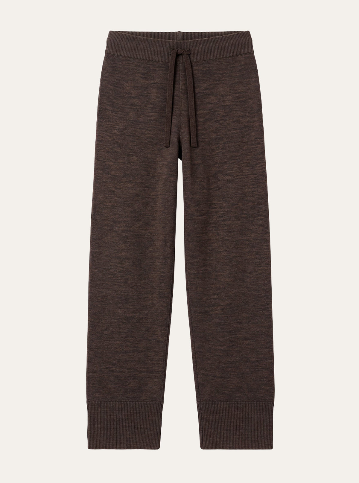 The Geilo Track Pant Women by We Norwegians is a pair of brown knit sweatpants made from soft merino wool, crafted as the ultimate loungewear essential. Featuring an elastic waistband, drawstring, and ribbed cuffs, these machine-washable track pants are displayed laid flat on a plain off-white background.