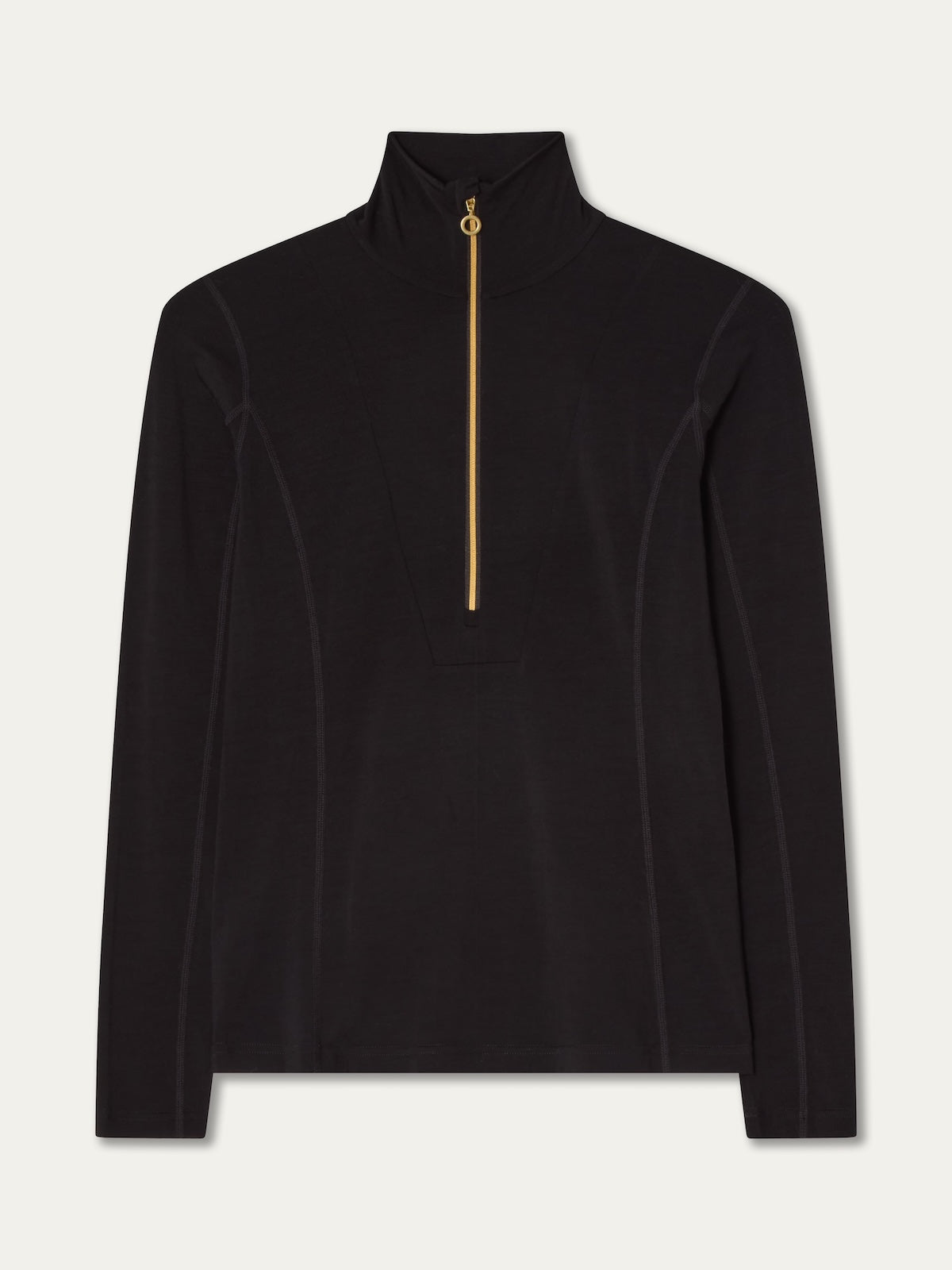The Sno Merino Zip Up Women by We Norwegians is a black long-sleeve top featuring a high collar and an elegant gold half-zip closure at the front. Expertly crafted from breathable jersey fabric, it boasts a smooth finish for a simple yet sophisticated look.
