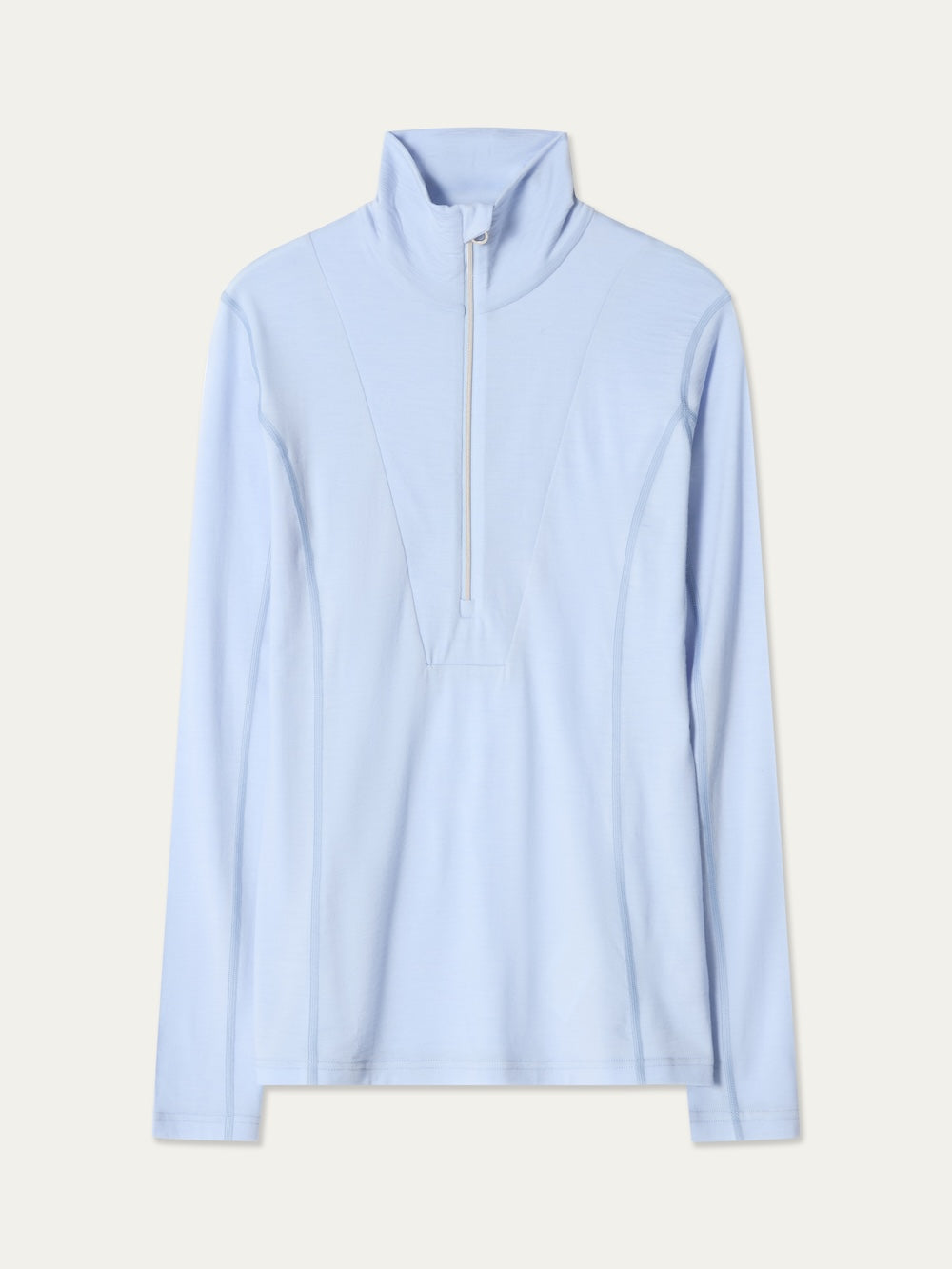 Light blue Sno Merino Zip Up Women base layer top in breathable merino wool with a high collar and a front quarter-zip.