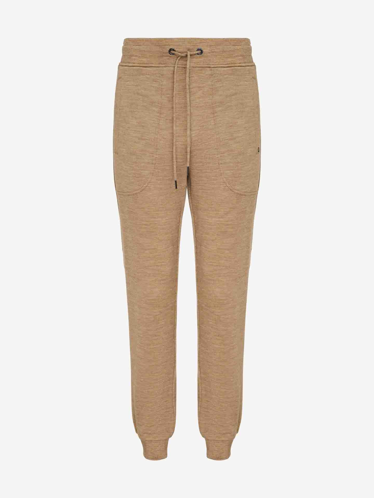 The Tind Joggers Men Camel from We Norwegians feature a drawstring waistband and two front pockets. These beige joggers are tapered with elastic cuffs at the ankles, embodying a contemporary-cool design. Made from incredibly soft material, they offer exceptional comfort, making them ideal for casual wear with a slouchy jogger feel.