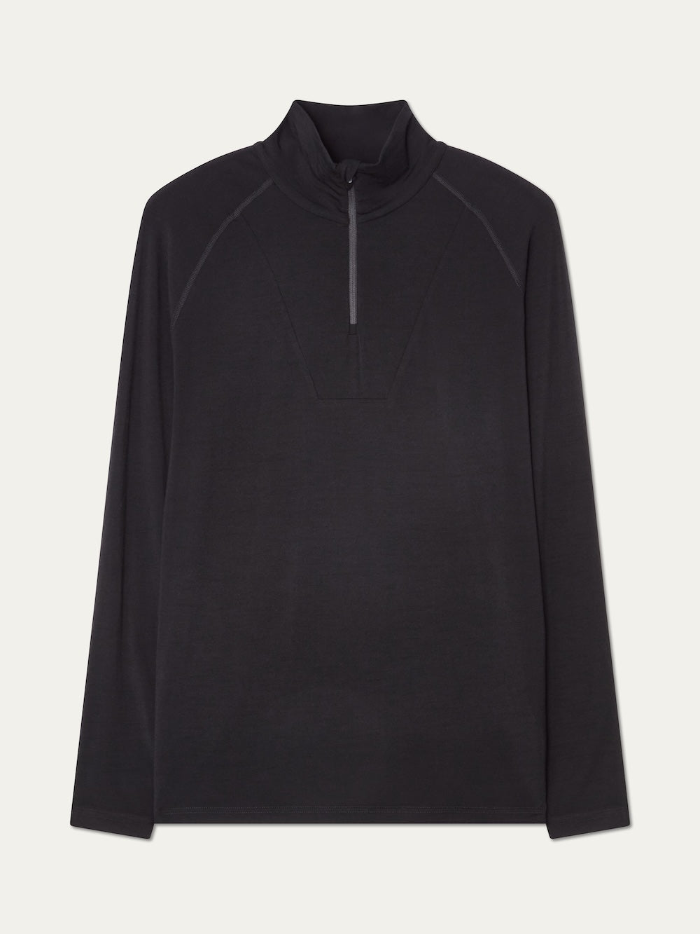 The Sno Merino Zip Up Men by We Norwegians is a long-sleeve, black pullover featuring a quarter-zip front, standing collar, and subtle seam accents on the shoulders and chest. Crafted as a breathable thermal layer, this shirt is shown laid flat against a plain, light background.