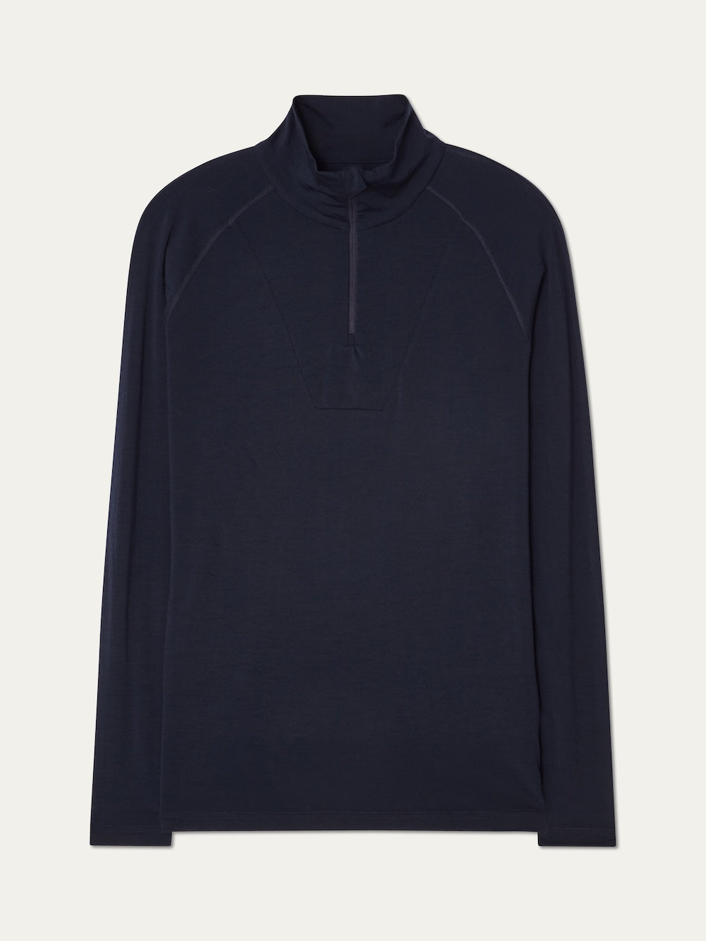 The We Norwegians Sno Merino Zip Up Men, a long-sleeve dark navy pullover featuring a high collar and partial front zipper, is displayed laid flat on a light background.