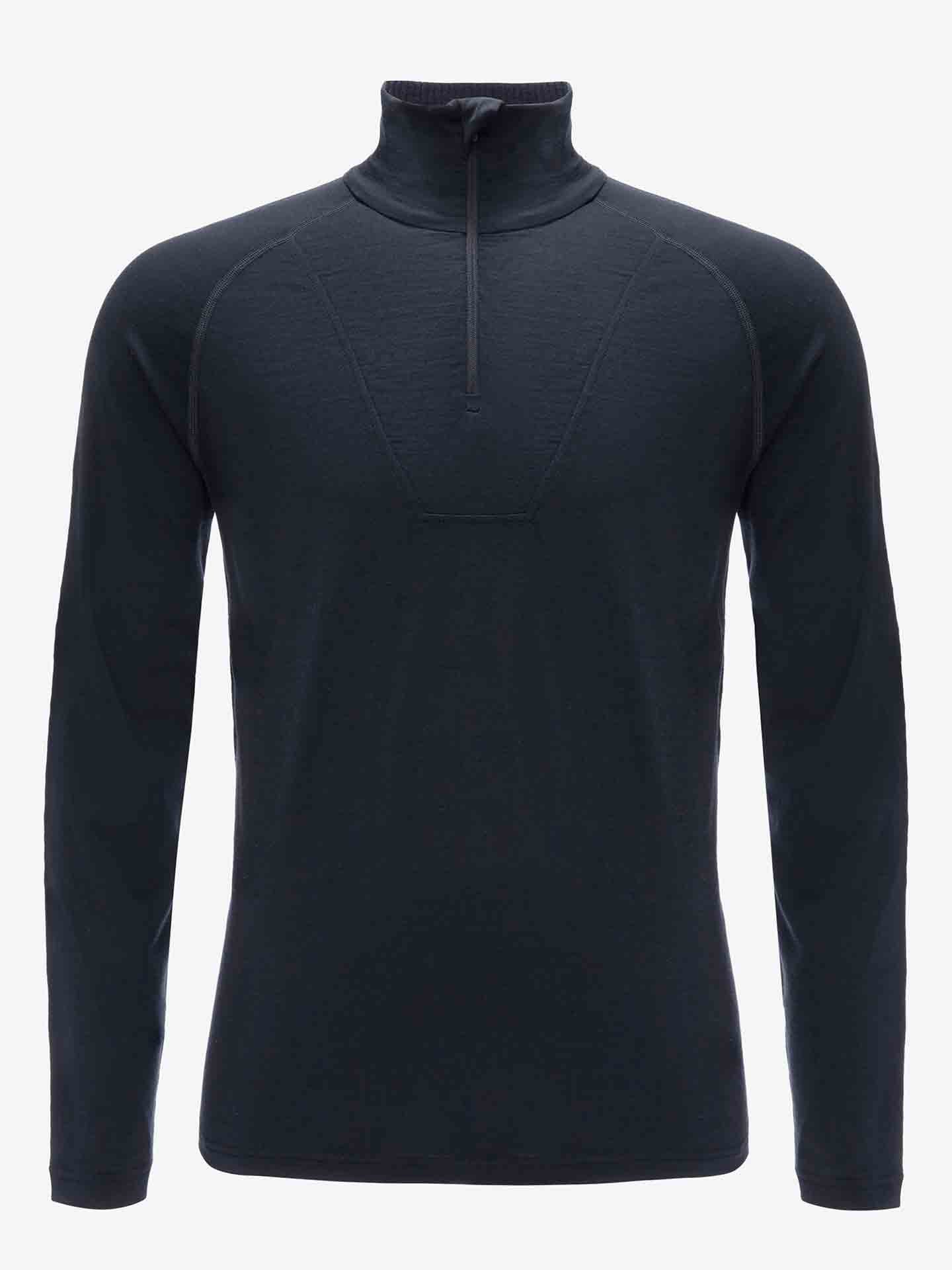 The Sno Merino Zip Up Men by We Norwegians is displayed against a white background. This black, long-sleeve athletic shirt features a high collar and subtle stitching details, crafted from lightweight, breathable merino wool fabric perfect for sports or casual wear. It emphasizes Scandinavian luxury base-layers.