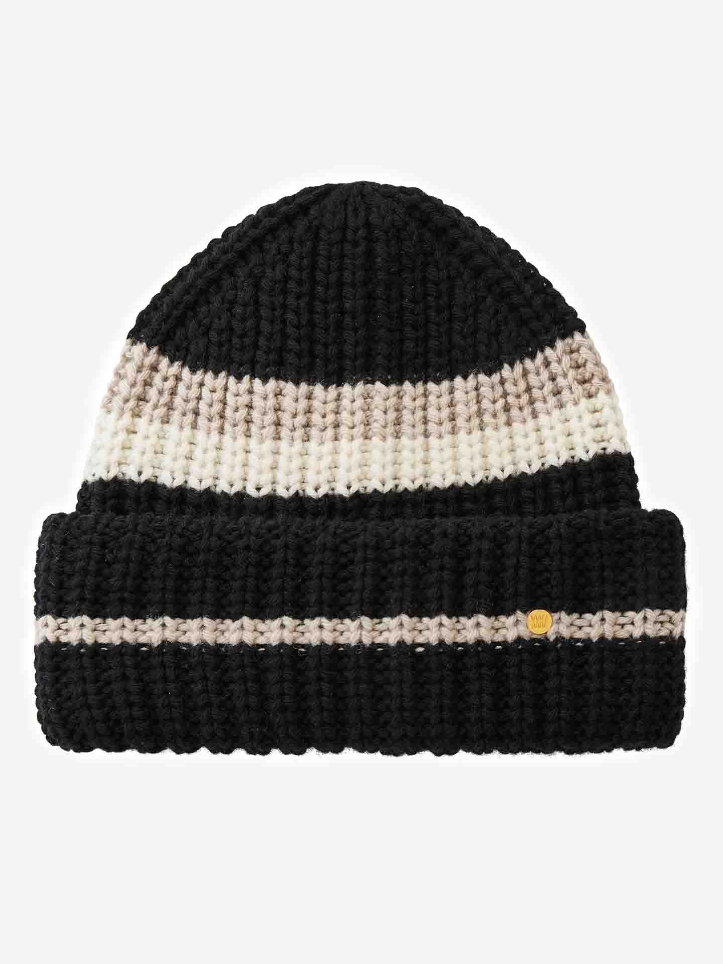 The Apres Ski Hat Women by We Norwegians is a knitted beanie featuring wide horizontal stripes in black, beige, and white. Made from a luxurious merino cashmere blend, this hat boasts a folded cuff with the same color pattern and a small embroidered yellow dot, evoking 70's ski fashion for the perfect Après Ski vibe.