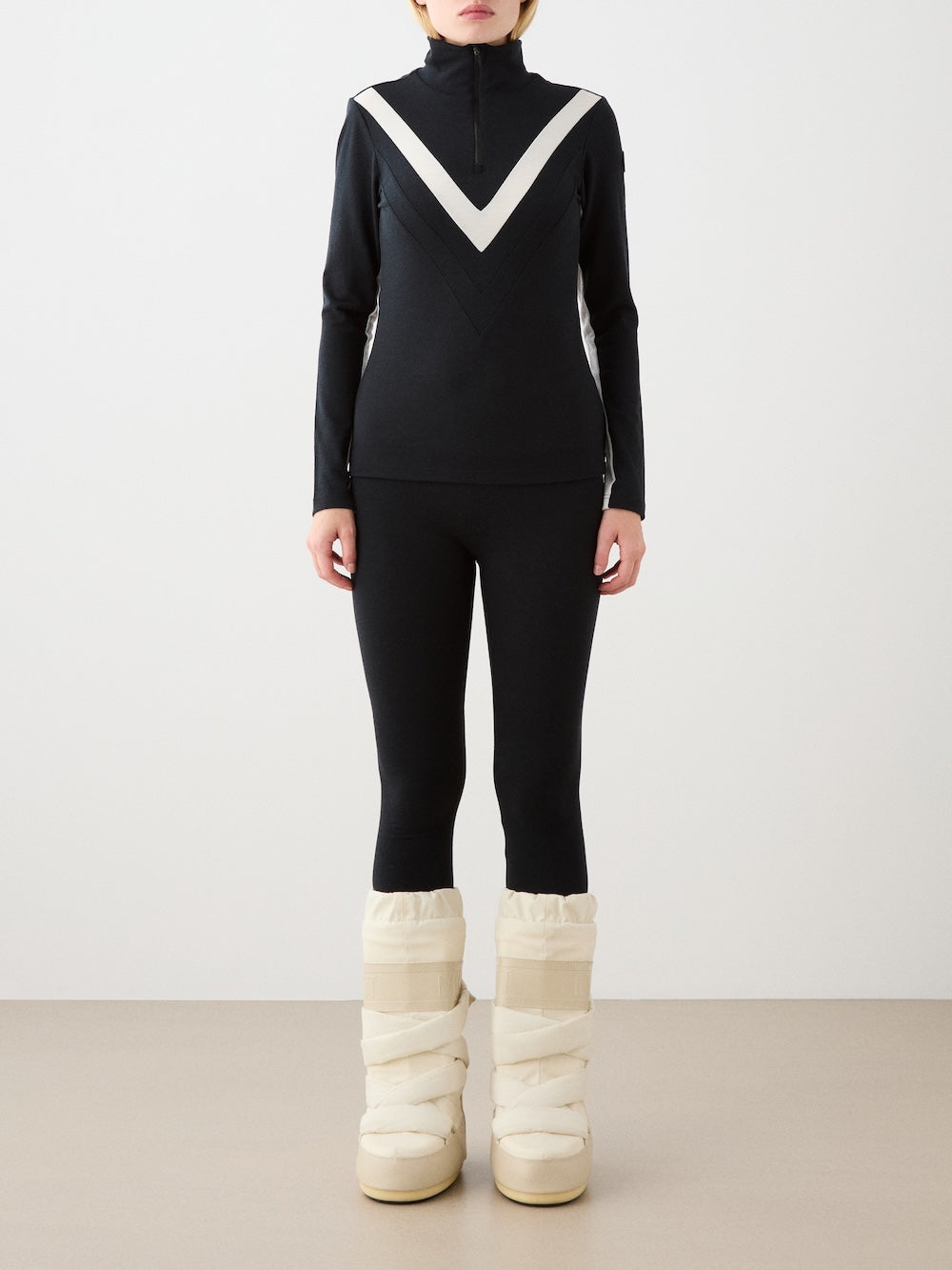 We Norwegians | FW25 | Womens Ski Basic legging_Black | Model is wearing these fine pair of knitted leggings that make a perfect base layer | Image shot against an off-white background | Front