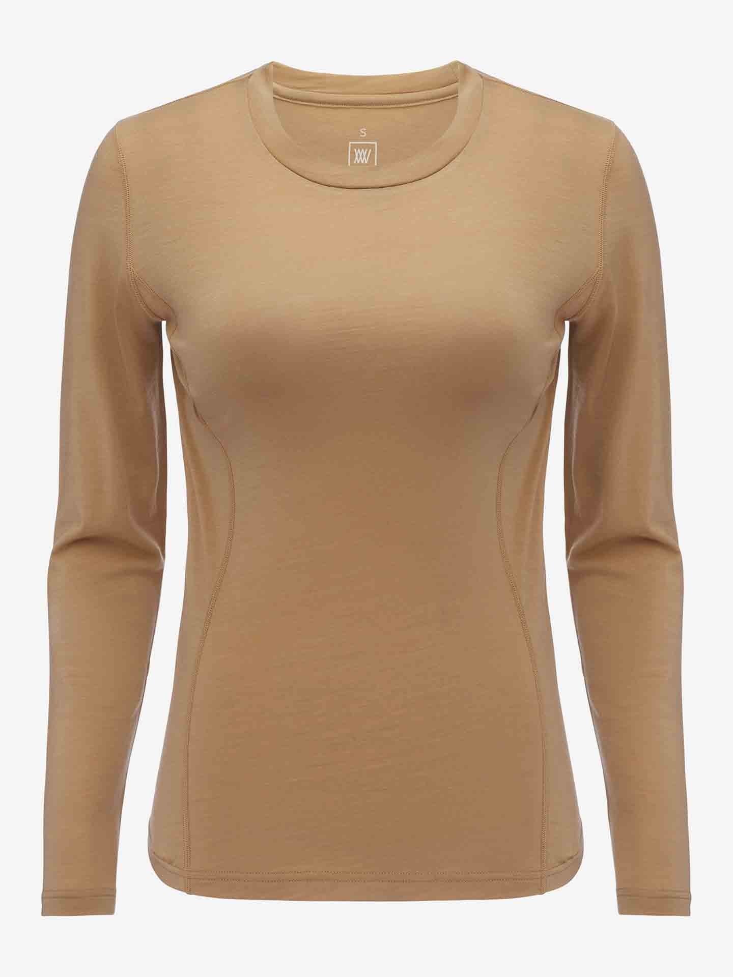 A long-sleeved, light brown "Sno Merino Crewneck Women" shirt by We Norwegians, made from super fine merino wool, is displayed against a plain white background. The shirt features a round neckline and boasts a minimalist design without any visible logos or patterns, epitomizing Scandinavian luxury base-layers.