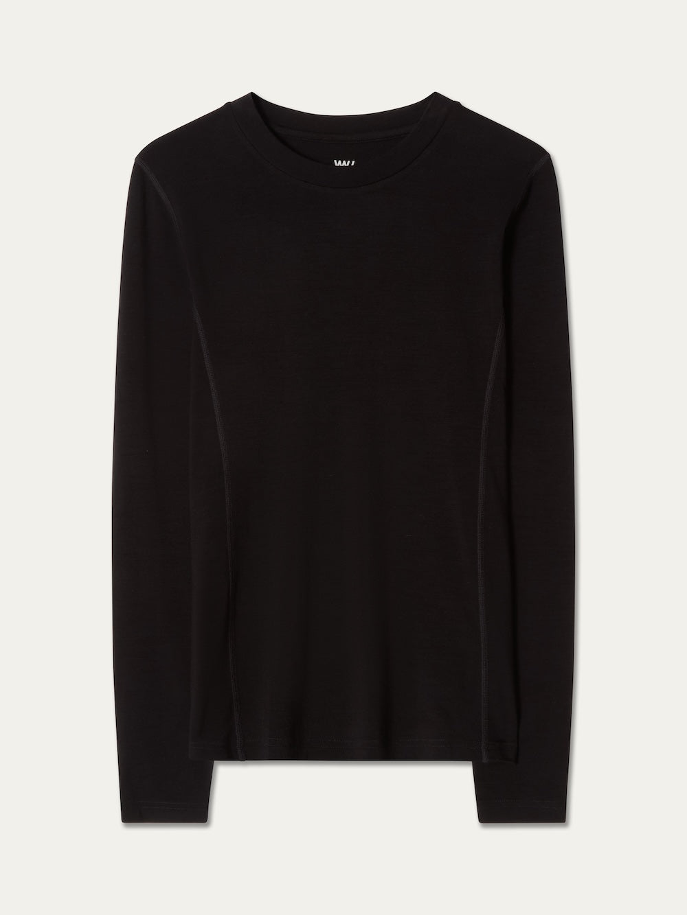 The Sno Merino Crewneck Women by We Norwegians is a plain black, long-sleeve crew neck shirt in breathable jersey fabric with a simple, classic design and no visible patterns or logos.
