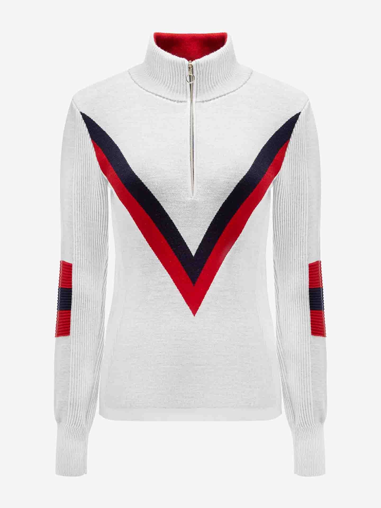 The Hafjell Zip Up Women by We Norwegians is a long-sleeve white pullover sweater, expertly crafted from fine merino wool by skilled Italian knitters. It features a high collar with a front zip and boasts a bold red and dark blue chevron pattern on the front, along with matching red and blue stripes on the sleeves near the elbows—perfect for ski sweater enthusiasts.