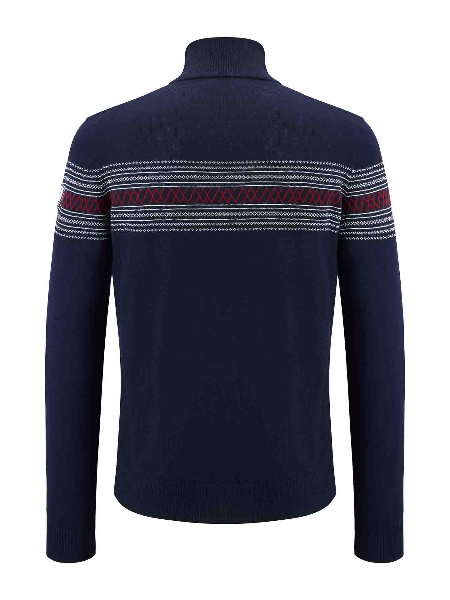 The Signature Zip Up Men from We Norwegians is a classic ski sweater in navy blue, featuring a high collar and a horizontal pattern of white and red geometric designs across the upper back and sleeves. Made from 100% merino wool, it also includes a ribbed hem and cuffs for added comfort.