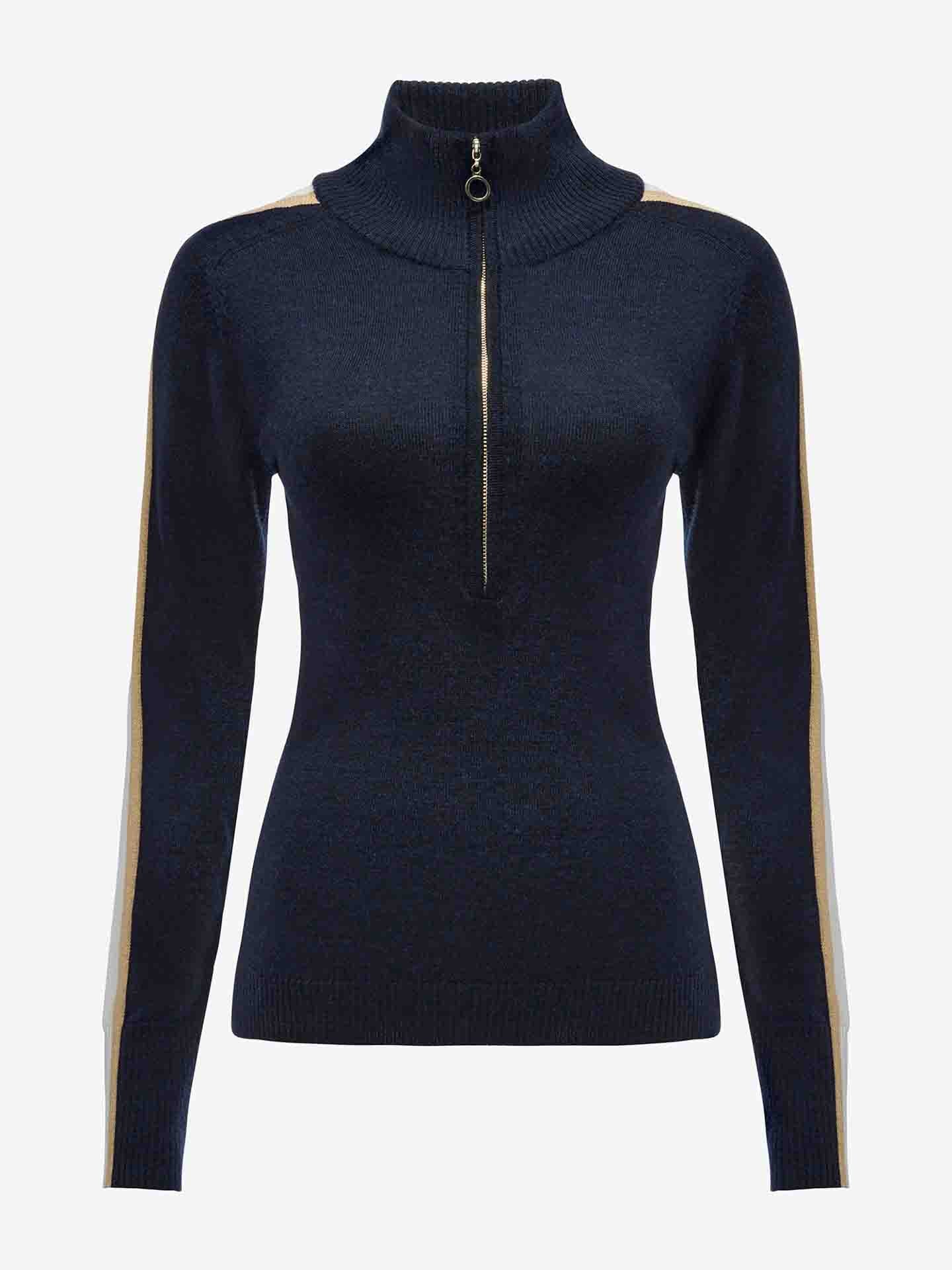 The Geilo Zip Up Women by We Norwegians is a black long-sleeve sweater with a high collar and half-zip front. Beige and white stripe accents run from the shoulders to the cuffs on the sleeves. Made from Merino Wool, this fitted design is perfect for après-ski evenings.