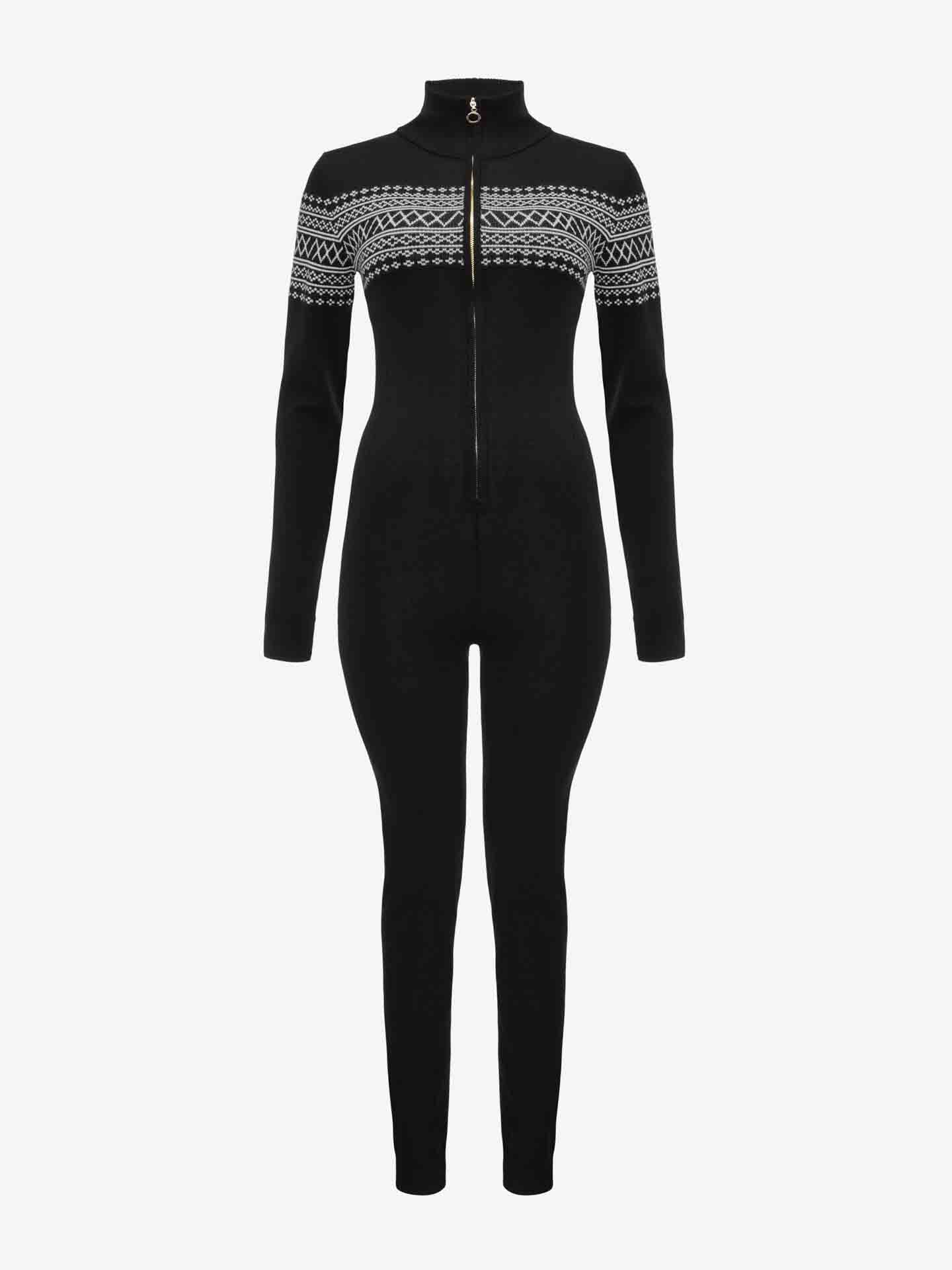 The Signature Jumpsuit Women by We Norwegians is a black, long-sleeve bodysuit crafted from washable merino yarn. It features a high collar and front zipper, with a white geometric pattern adorning the chest and upper arms. The form-fitting fabric extends to the ankles, making it an ideal base-layer for various activities.