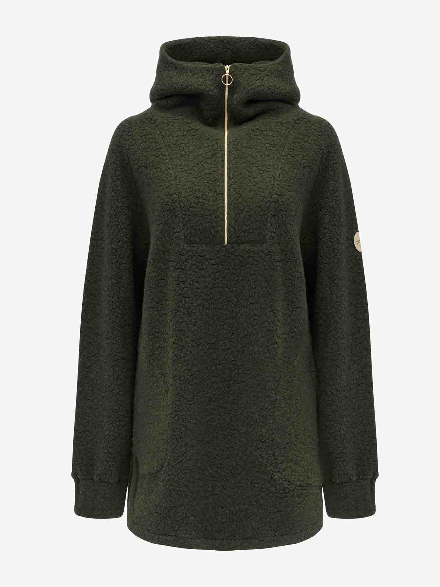 The Alta Shearling Hoodie Women by We Norwegians is a dark green fleece pullover with a high neck and a gold half-zip closure, perfect for après-ski wear. It features long sleeves with ribbed cuffs and a patch logo on the upper left sleeve. The fabric has a textured, soft appearance.