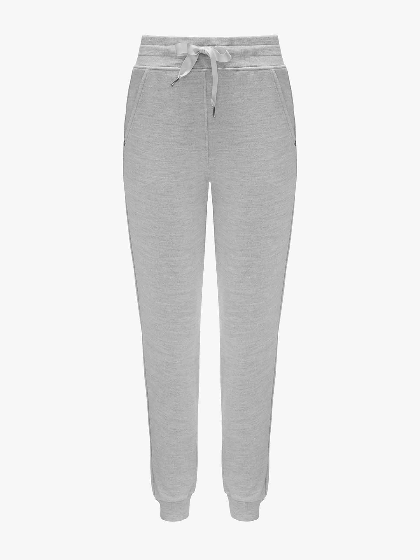 Gray Tind Jogger Women Grey Melange sweatpants by We Norwegians, featuring an adjustable drawstring waistband and two side pockets. These pants offer a tapered fit with cuffs at the ankles and are crafted from soft, comfortable Merino wool. The background is plain white.