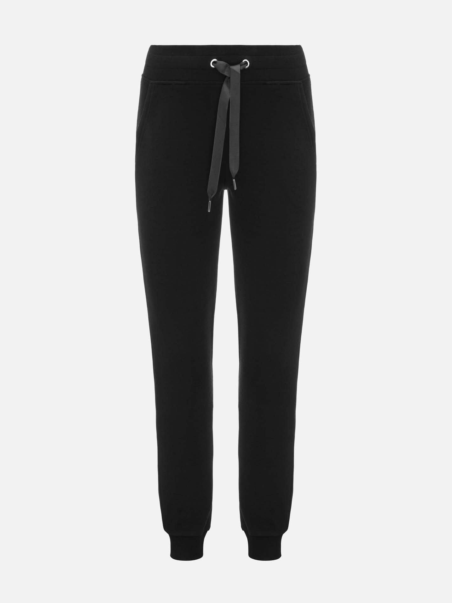 A pair of black jogger pants is displayed against a white background. The pants feature a relaxed fit with an elastic waistband, drawstring closure, and cuffed ankles. There are pockets on both sides, making it perfect to pair with the Tind Zip Up Sweater from We Norwegians for a complete Limited Time Bundle: Tind Zip Up & Tind Jogger Women.