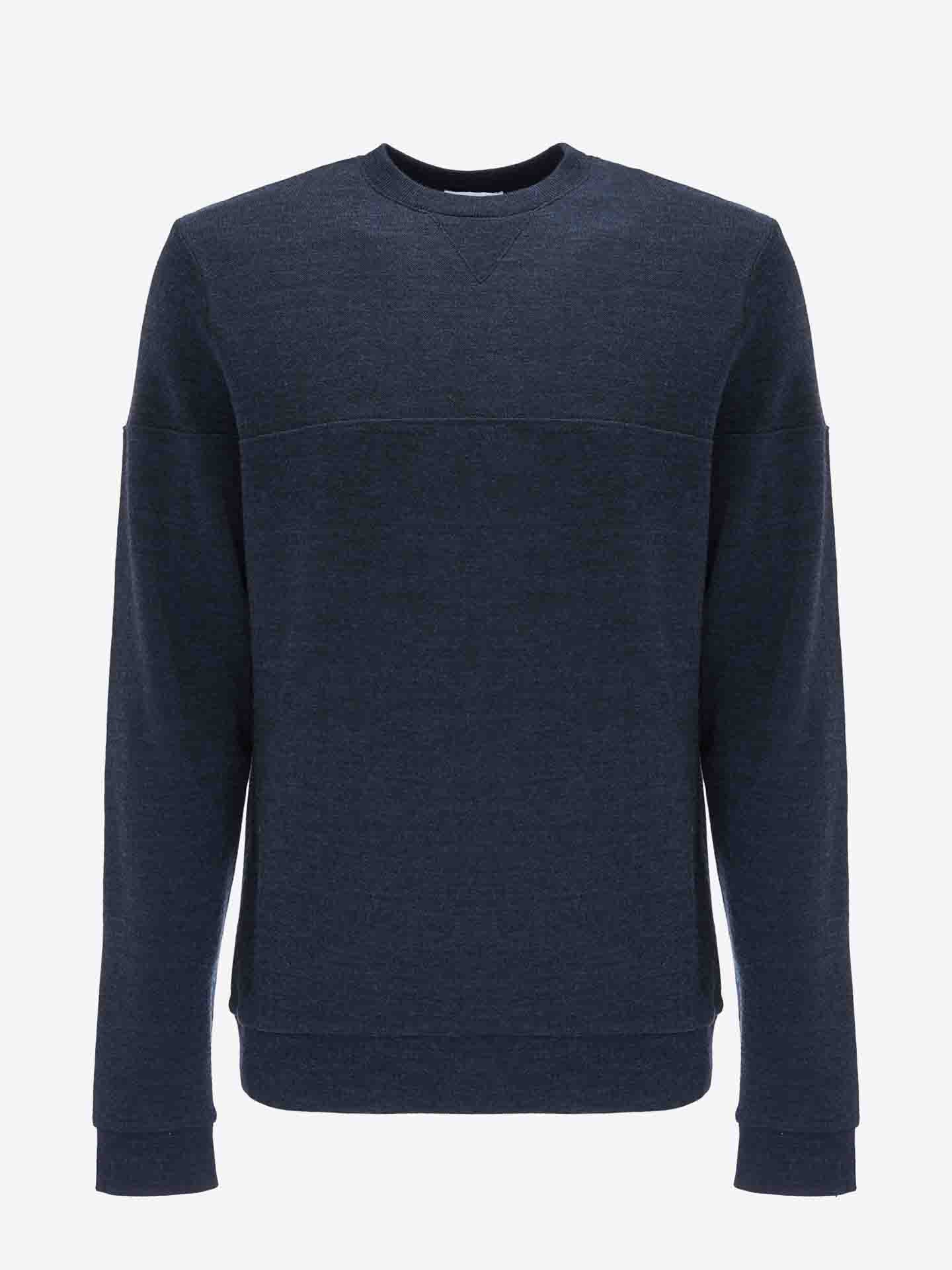 A plain navy blue crewneck sweatshirt with long sleeves, displayed against a white background. Made from cozy Merino wool, the Tind Crewneck Men by We Norwegians features a fitted design with ribbed cuffs, hem, and neckline—perfectly complementing your Tind Joggers for an effortlessly stylish sportswear look.