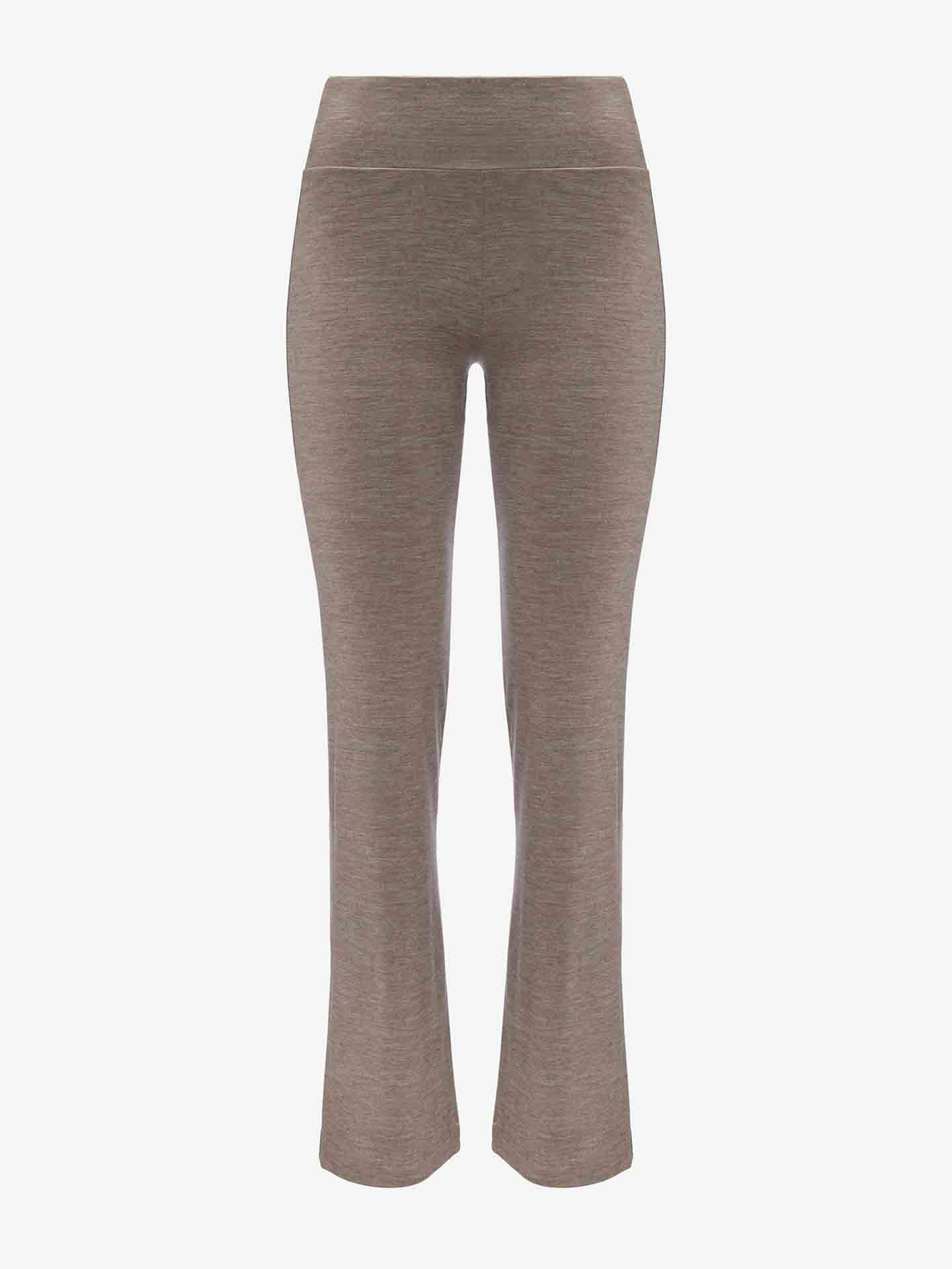 An image of We Norwegians' Hygge Flared Pant Women, a pair of high-waisted, taupe-colored, straight-leg pants crafted from soft, textured merino wool. The sleek, minimalistic design features no visible pockets or embellishments, making them perfect for those seeking both comfort and style in their base layer.