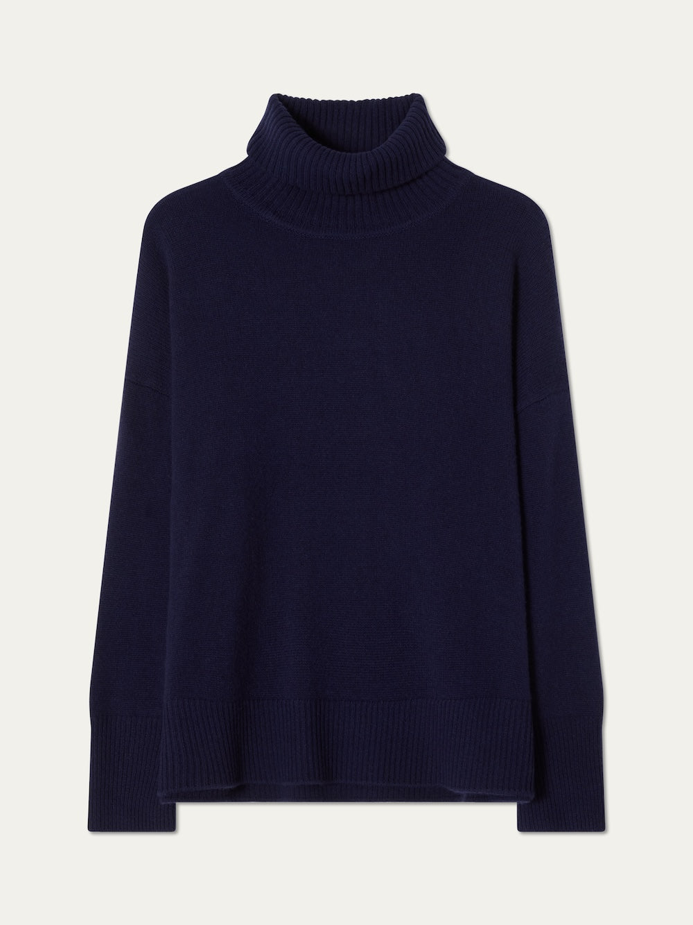 The Blefjell Sweater Women by We Norwegians is a navy blue, long-sleeve pure cashmere turtleneck with ribbed cuffs, hem, and collar—luxurious knitwear displayed on a light background.