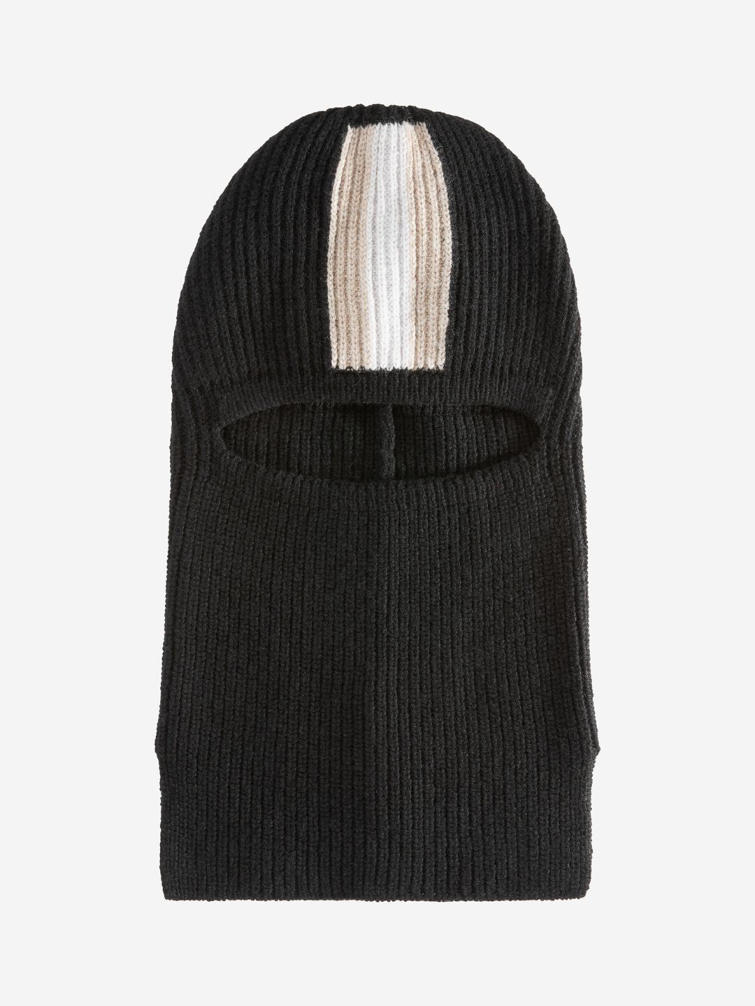 The We Norwegians Apres Ski Balaclava is a black knit balaclava with an eye opening that captures the essence of 70s ski fashion. It features a vertical stripe in beige and white running from the top to the middle of the forehead, and its ribbed merino wool fabric ensures both warmth and style.