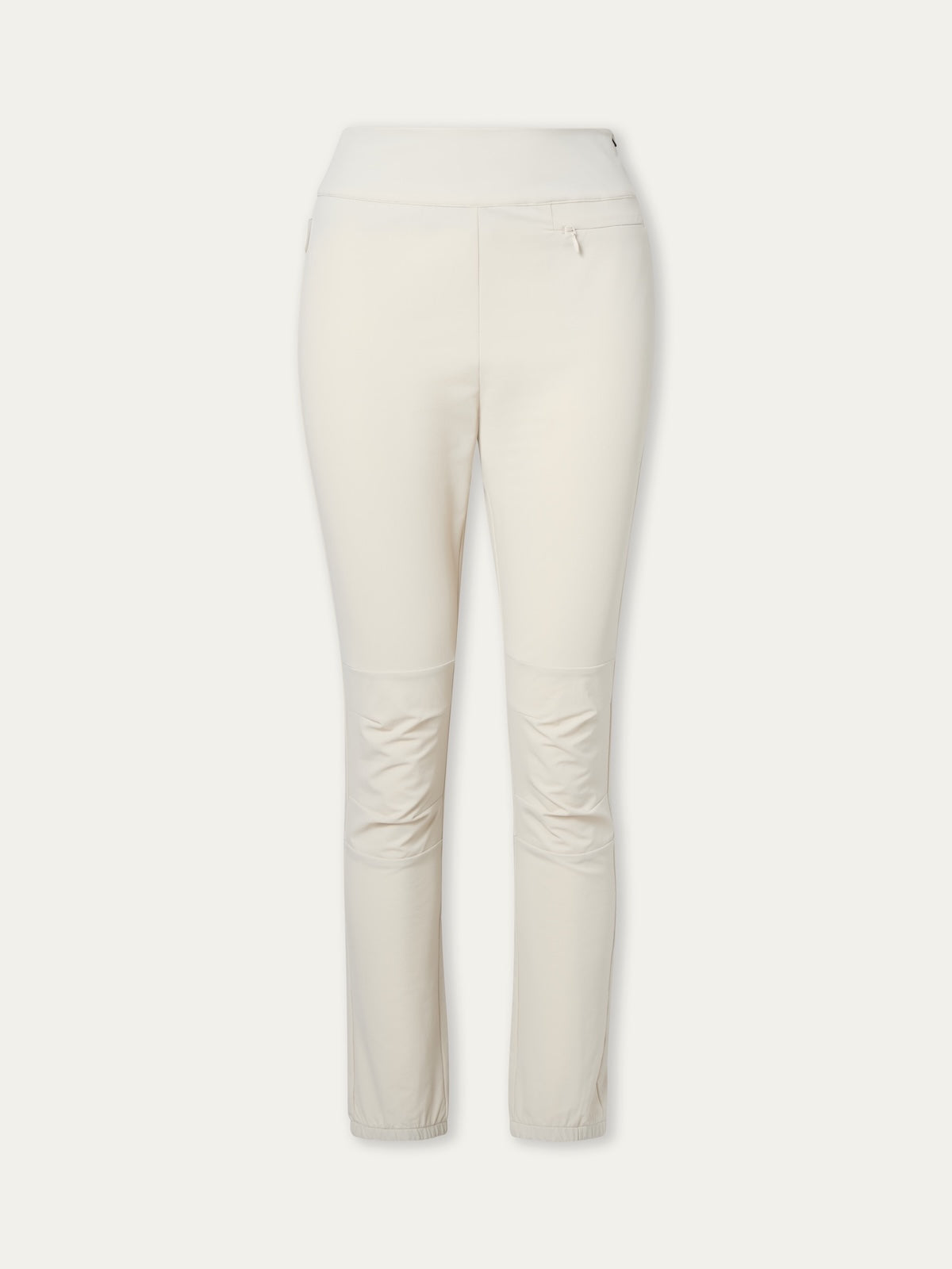 A pair of fitted, high-waisted We Norwegians Beito Pant Women in off-white with a small zippered right pocket—ideal for outdoor training—displayed on a plain light background.