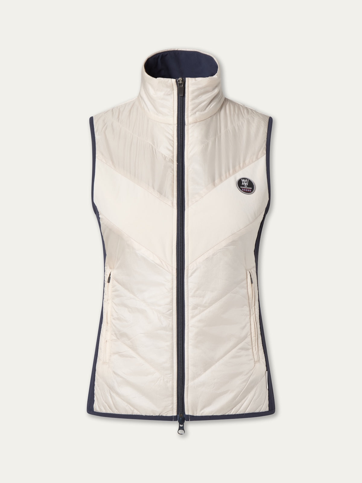 The We Norwegians Beito Vest Women is a sleeveless, quilted white vest with a high collar, black trim, zip front, two zip pockets, non-fluorinated DWR finish, and a small round logo patch on the left chest.