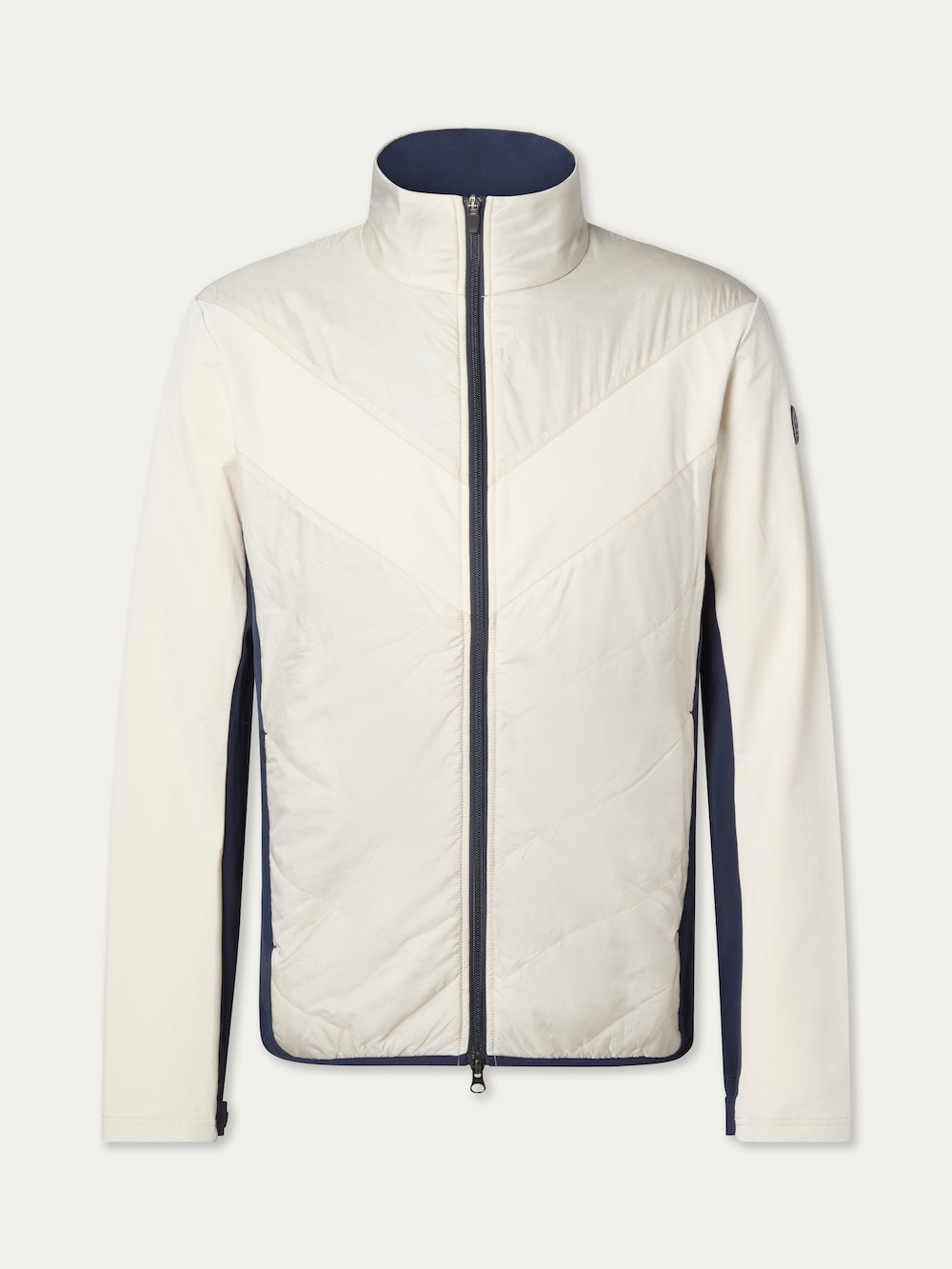The We Norwegians Beito Jacket Men is a white merino wool zip-up with a high collar, navy side panels, diagonal front stitching, and dark navy lining and cuffs—designed for cold-weather adventures.
