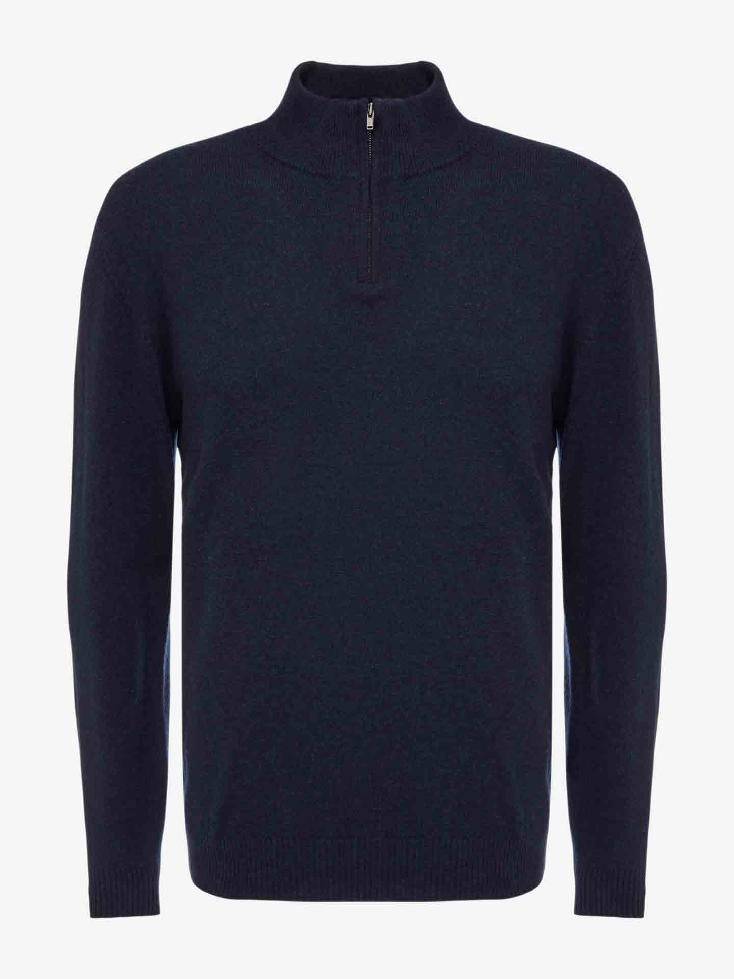 Introducing the Blefjell Zipup Men by We Norwegians, a luxurious dark navy, long-sleeve cashmere sweater featuring a high neck and half-zip YKK zipper closure. This exquisite piece boasts a ribbed collar, cuffs, and hem, and its plain knit texture adds to its timeless classic appeal—making it an essential staple for any wardrobe.