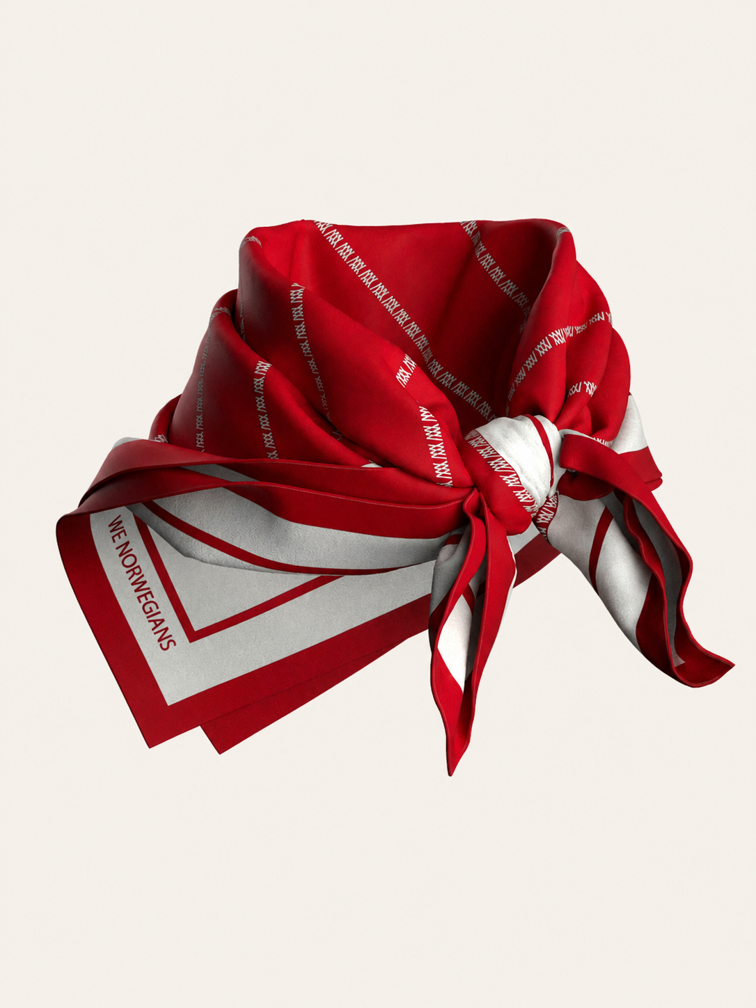 The We Norwegians Ship Silk Scarf, featuring bold red and white geometric patterns and text along the borders, is shown tied in a loose knot against a plain light background. This luxurious silk-twill accessory brings effortless sophistication to any ensemble.