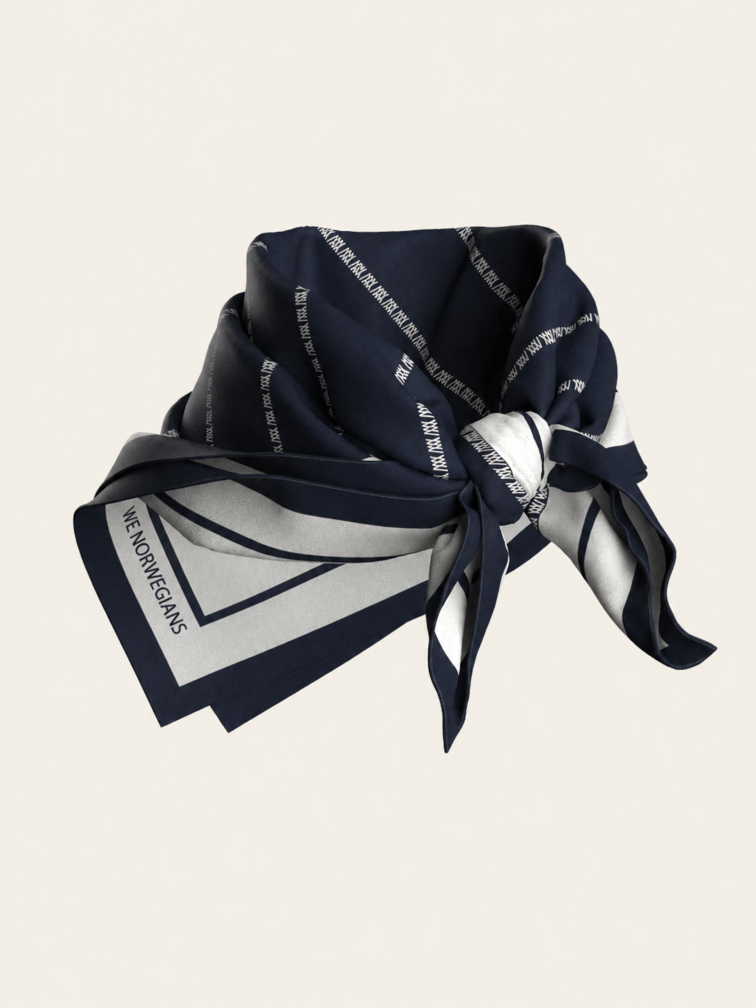 The We Norwegians Ship Silk Scarf, featuring navy blue and white geometric patterns and text on luxurious silk-twill, is elegantly folded and knotted with visible corners and edges against a light background—making it a refined designer accessory.
