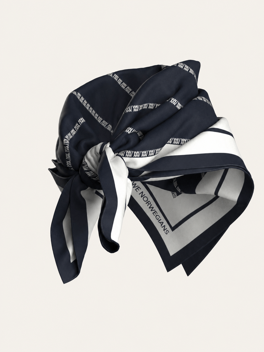 The Ship Silk Scarf by We Norwegians features a navy blue and white pattern in fine silk twill, tied in a knot to showcase its detailed stitching and the “NORME NORWEGIANS” text printed along one edge. This designer accessory effortlessly elevates any look.
