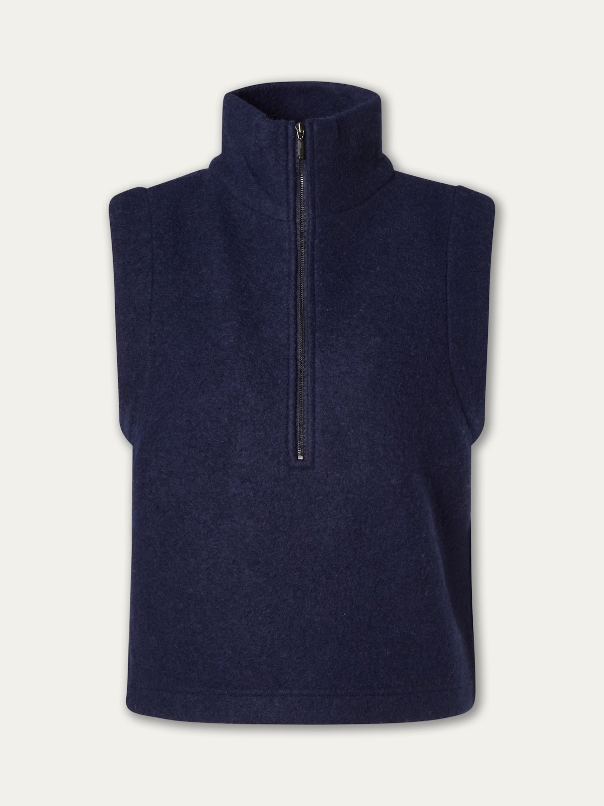 The Alta Vest Women by We Norwegians is a sleeveless navy blue fleece vest with a high collar and half-zip front, ideal for layering. Shown on a plain white background.