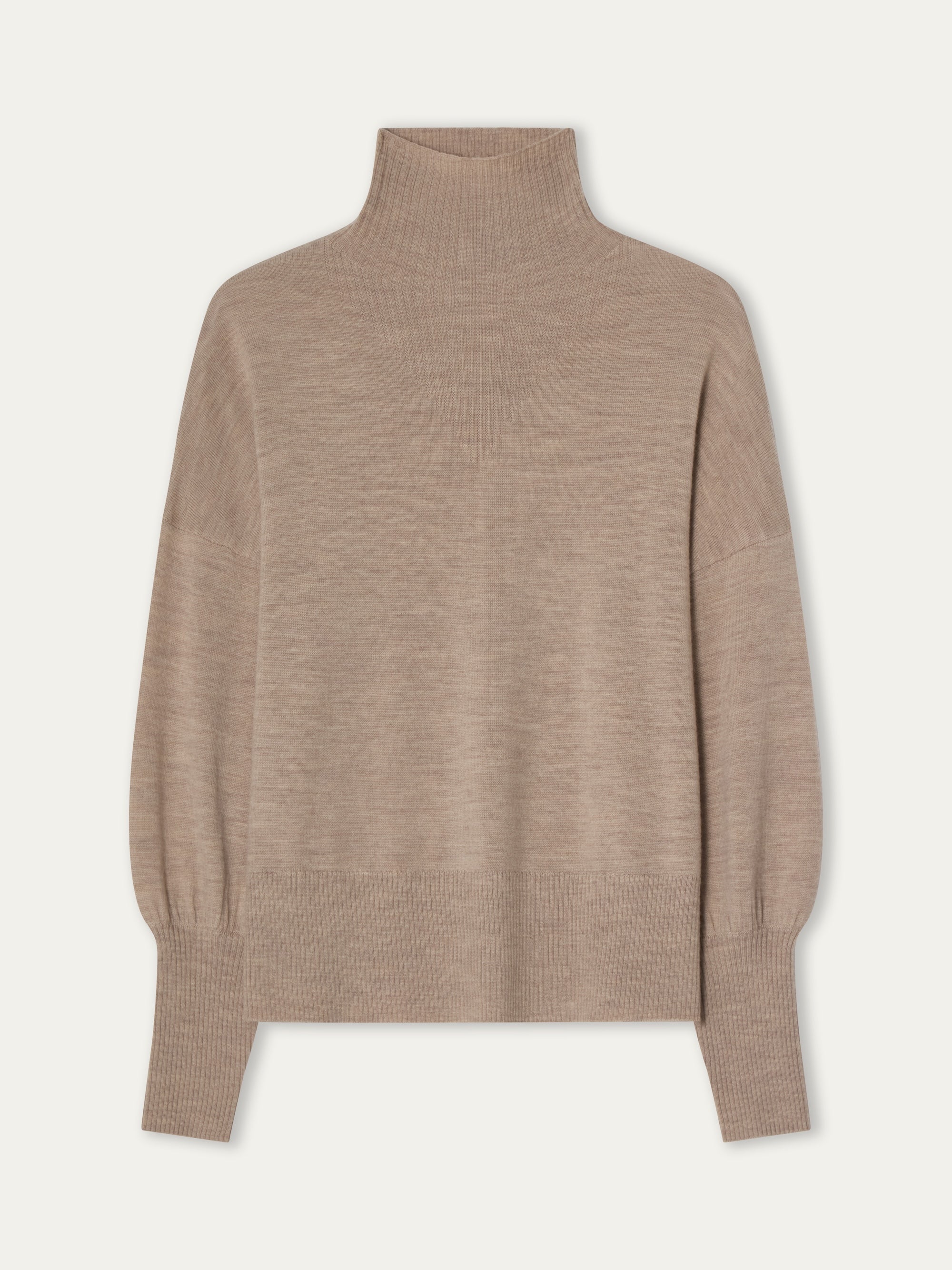 The Geilo Oversized Sweater Women by We Norwegians is a beige, long-sleeve merino wool knit with a relaxed fit and ribbed collar, cuffs, and hem, shown against a plain light background.