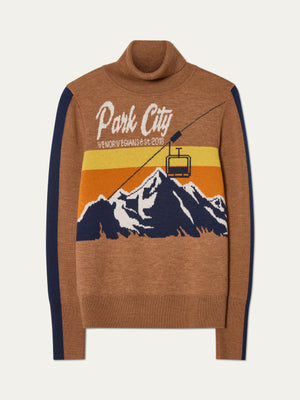 The Afterski Sweater Women by We Norwegians is a brown merino wool turtleneck with "Park City" and "We Norwegians Est 2018," plus a mountain, cable car, and sunset design—perfect for a vintage ski look.